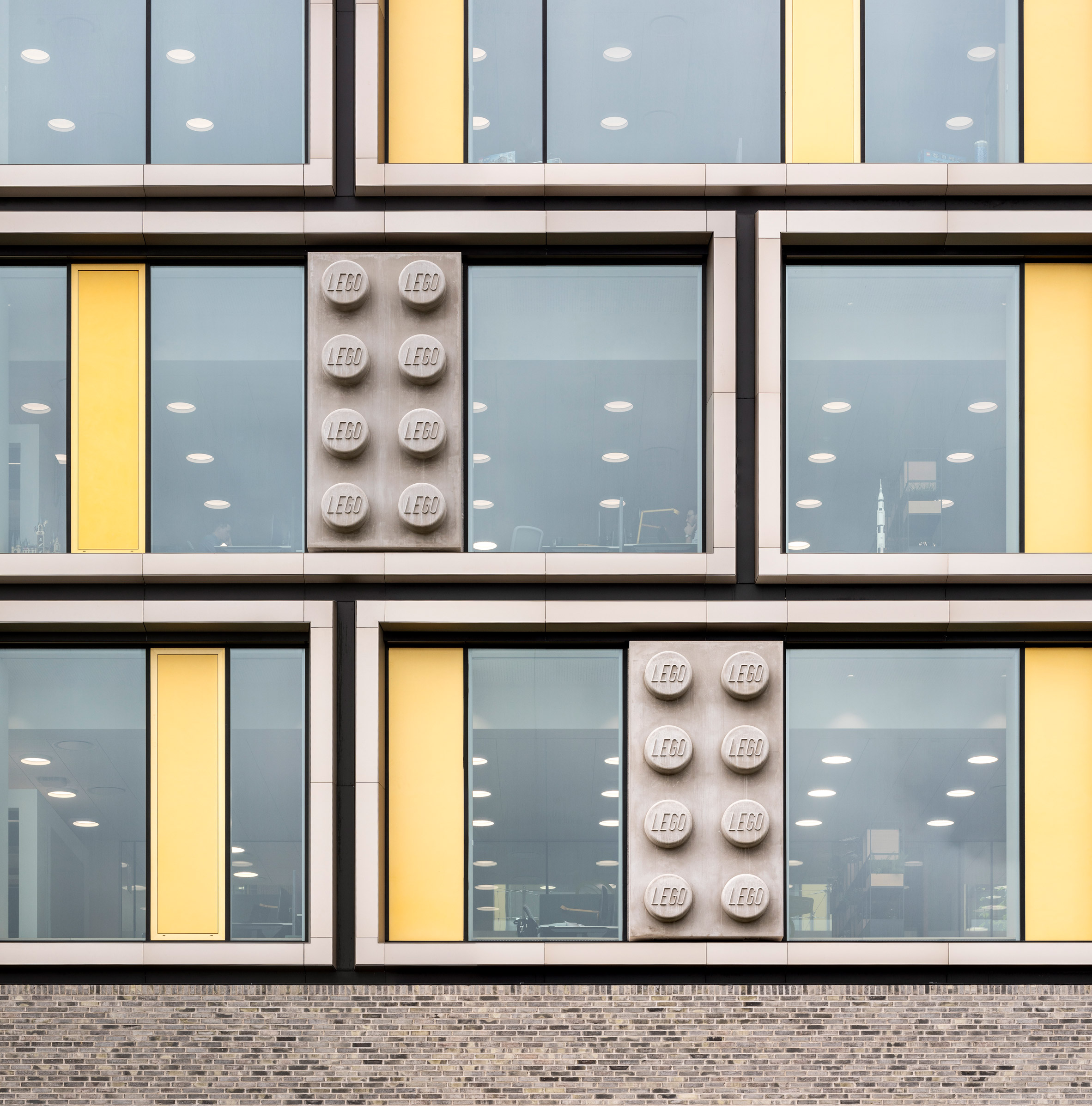 ring Miniature ketcher CF Møller Architects incorporates giant bricks in facades of Lego office