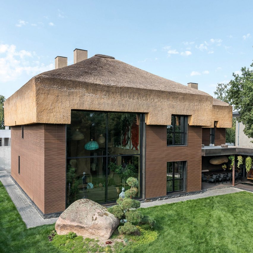 Sergey Makhno designs own thatch-roofed home filled with ceramics