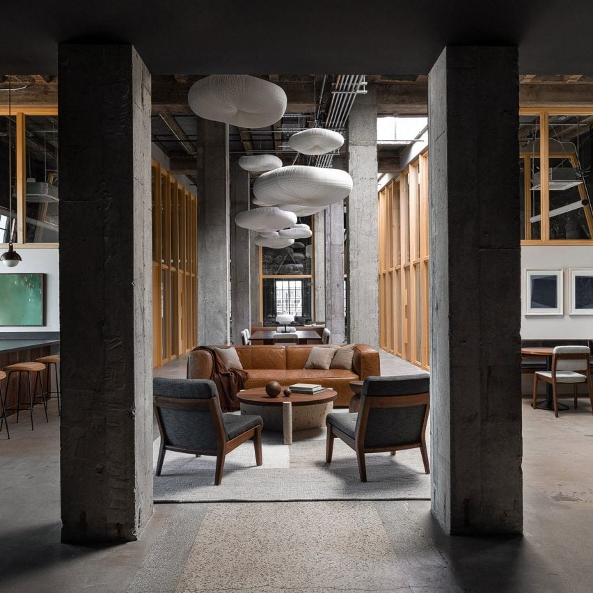 JHL Design converts abandoned Portland penthouse into moody office space for tech firm