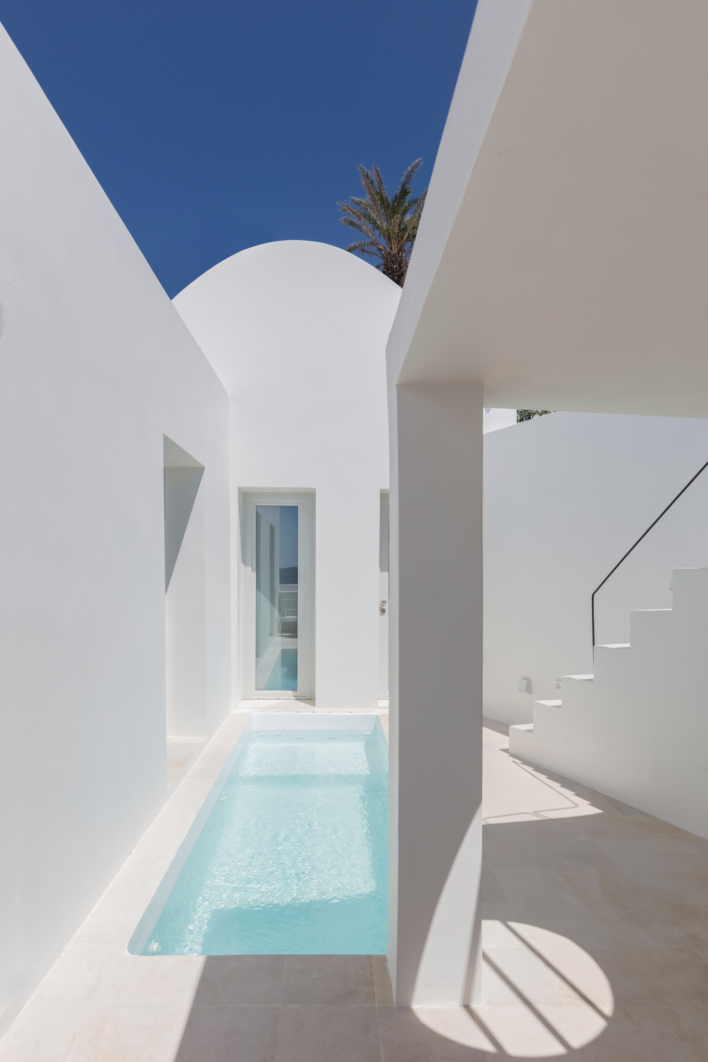 Two holiday residences in Fira caves by Kapsimalis Architects