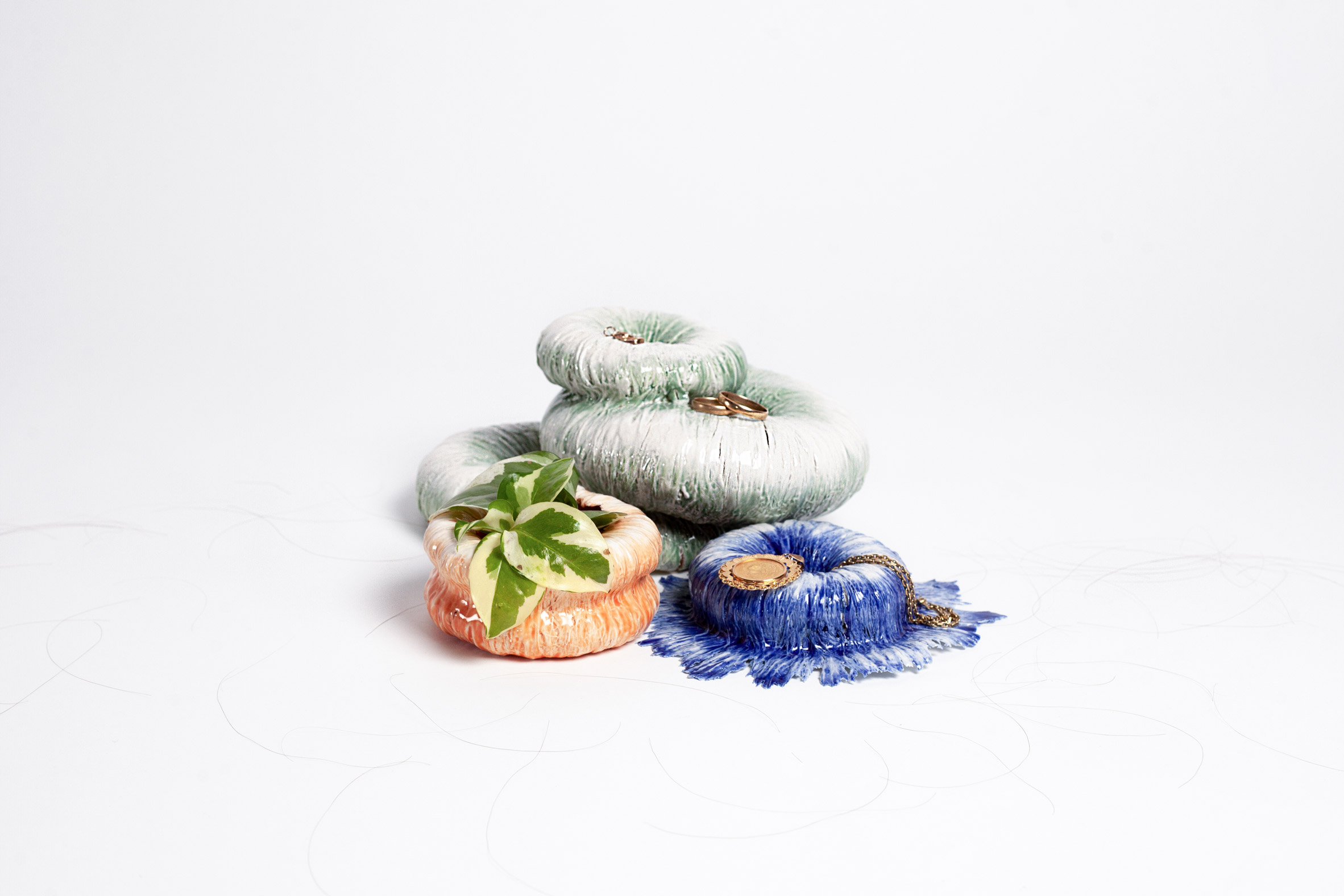 Céline Arnould makes commemorative porcelain bowls from the hair of loved ones