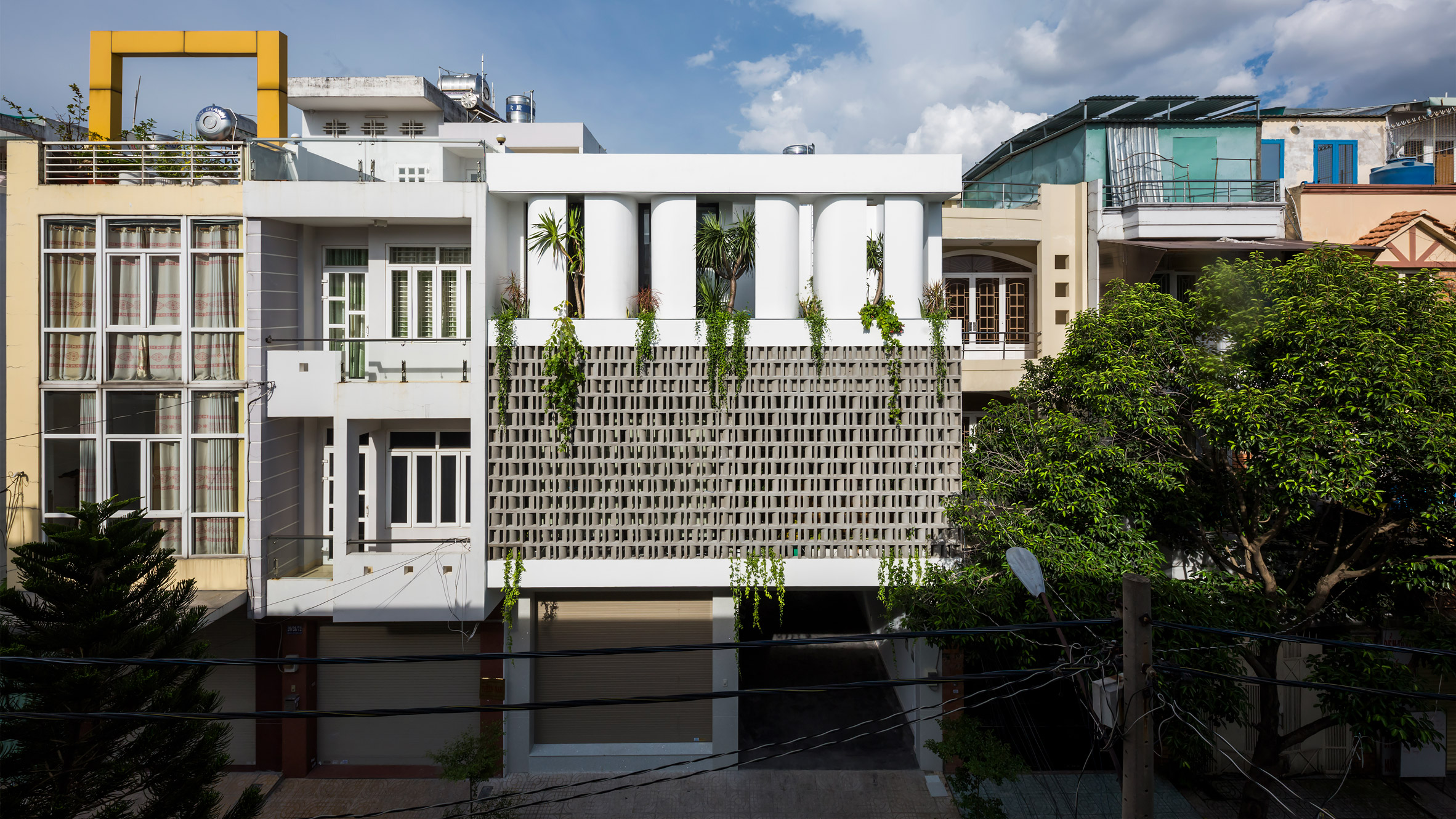 Perforated Brick Facade Shades House For A Daughter In Vietnam - 