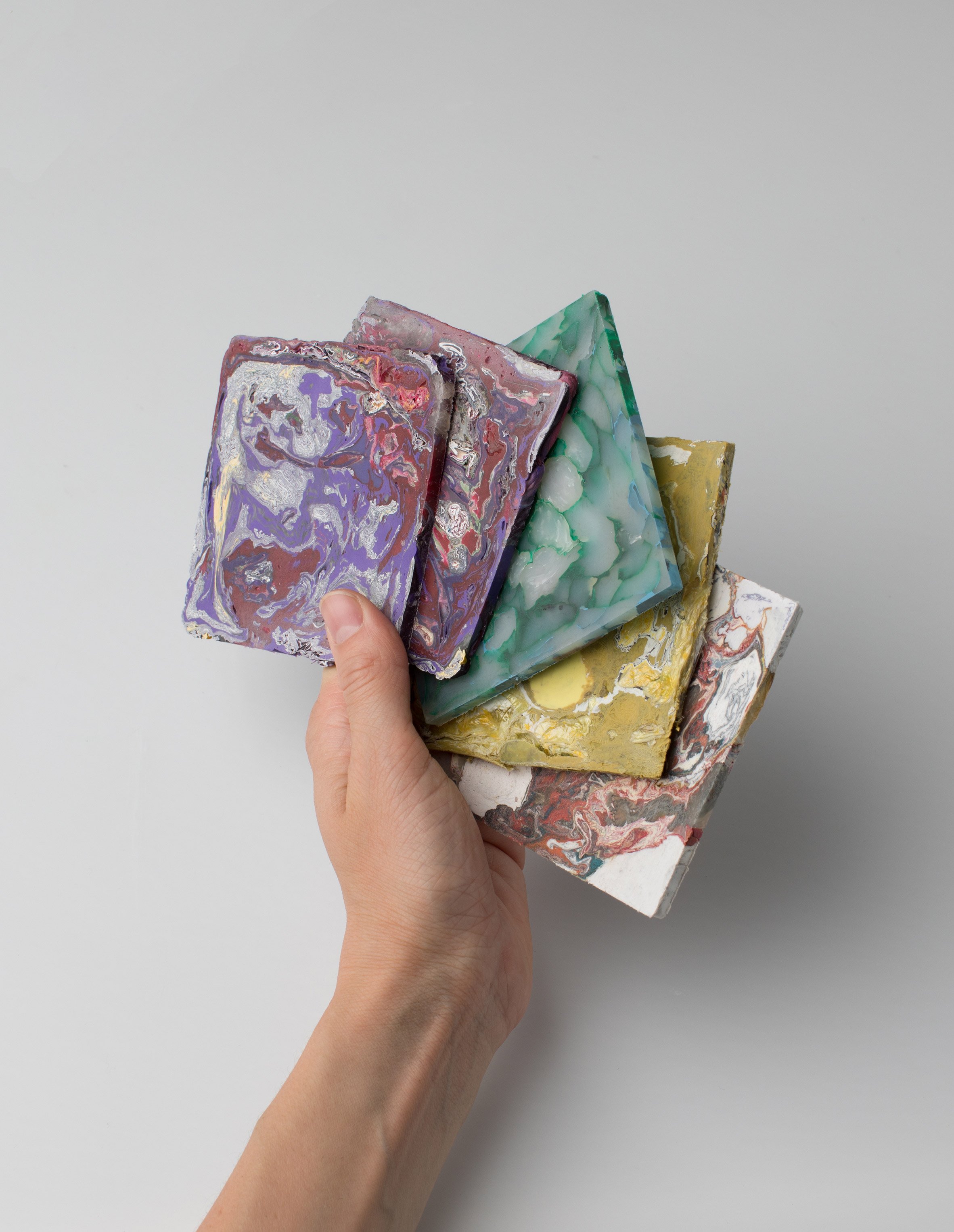 Enis Akiev makes marbled tiles from post-consumer plastic waste