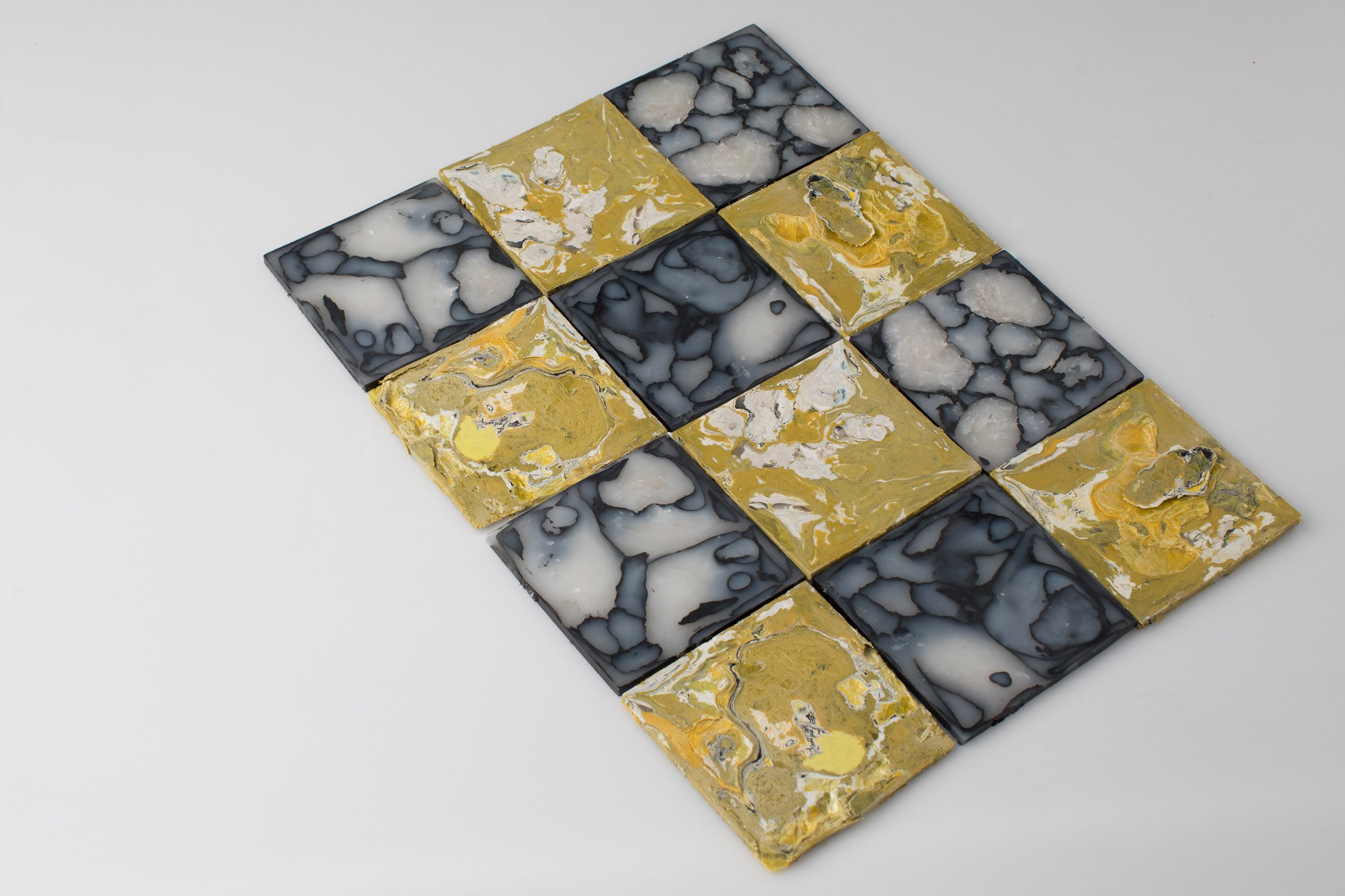 Enis Akiev makes marbled tiles from post-consumer plastic waste