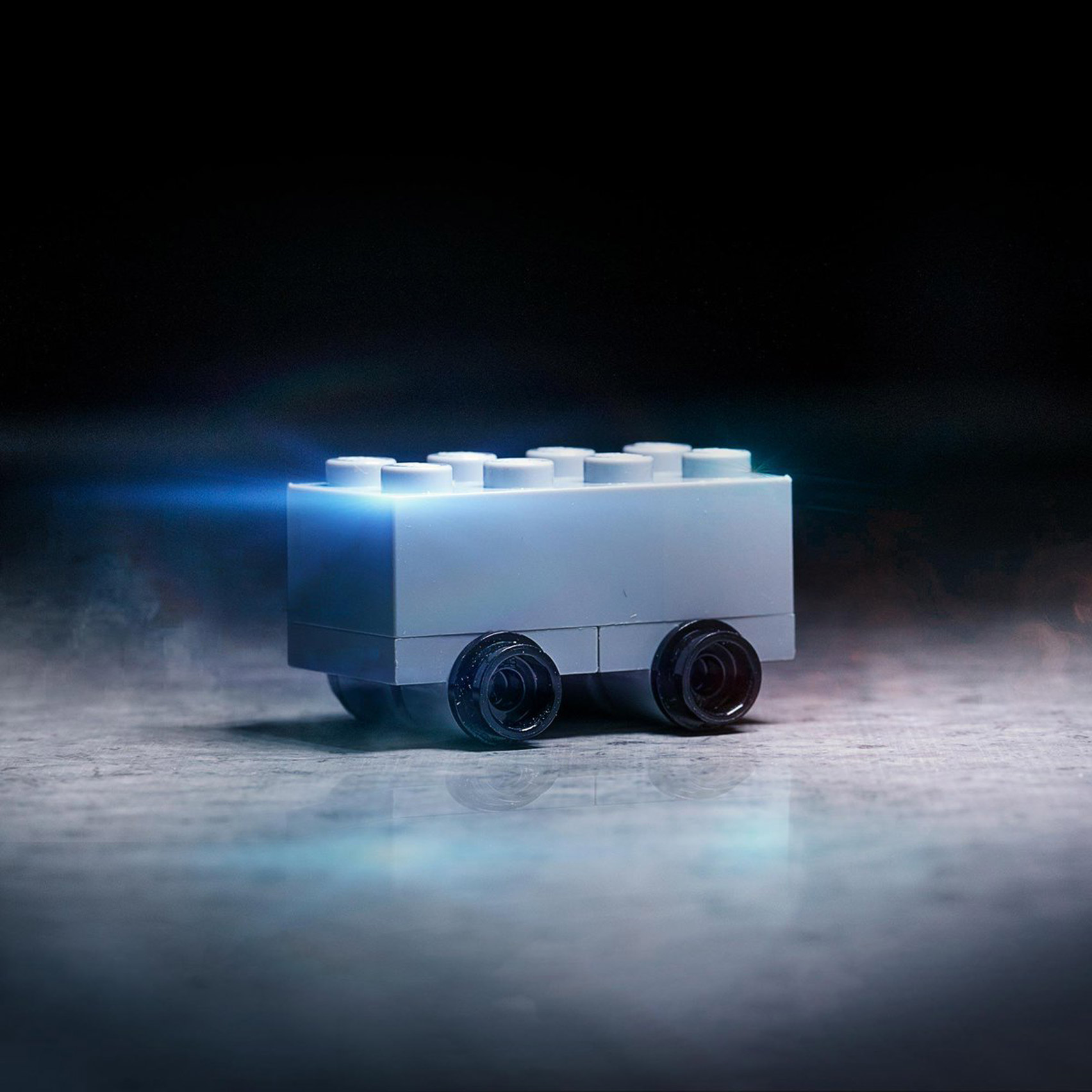 Lego Tesla with plastic brick model of Cybertruck