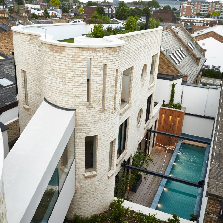 Alex Michaelis wraps his London family home with curvy brickwork walls