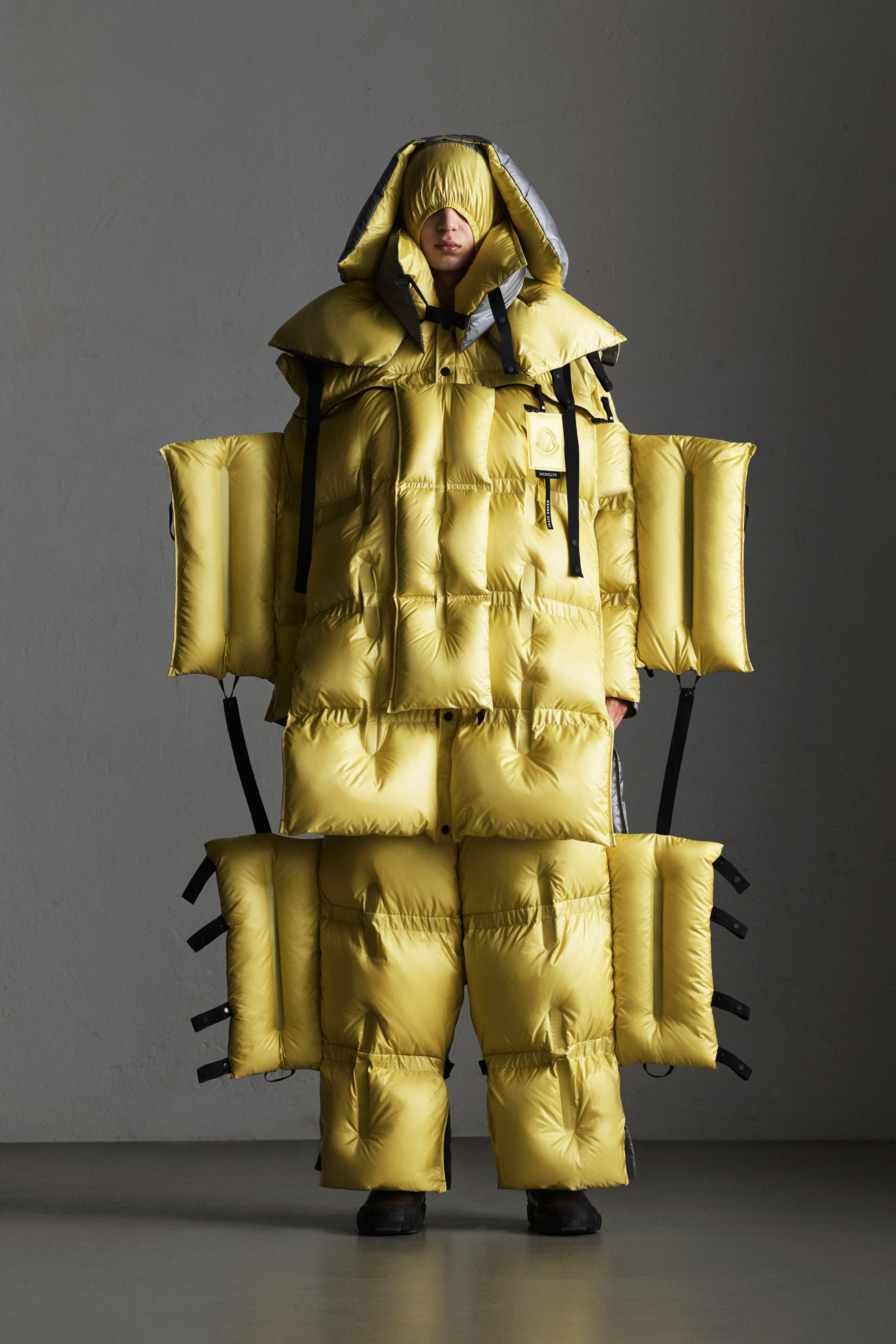 Craig Green's oversized Moncler puffer suit can be rolled up like a ...