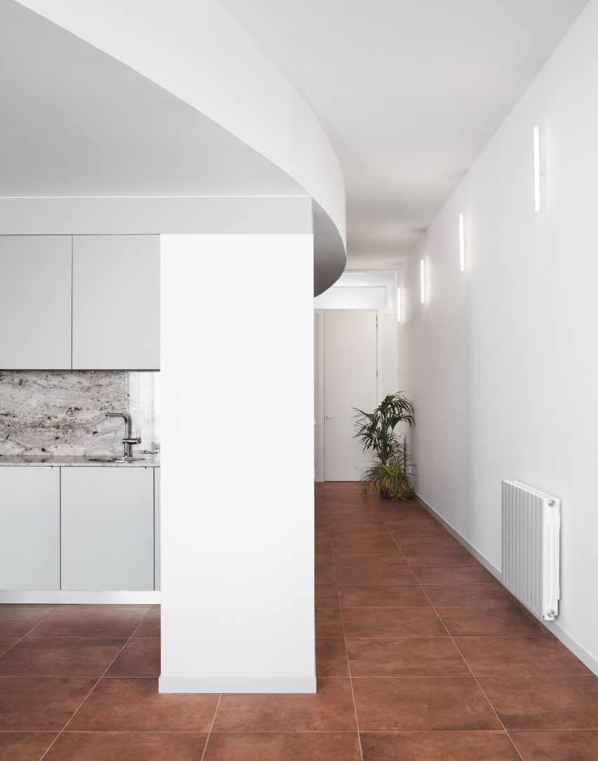 Hiha Studio Breaks Up Linear Apartment Layout With Curved