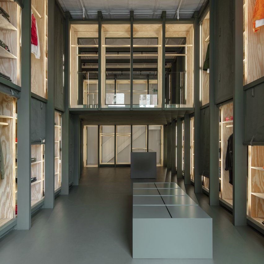 Green plywood cabinets outfit Maharishi store in New York City