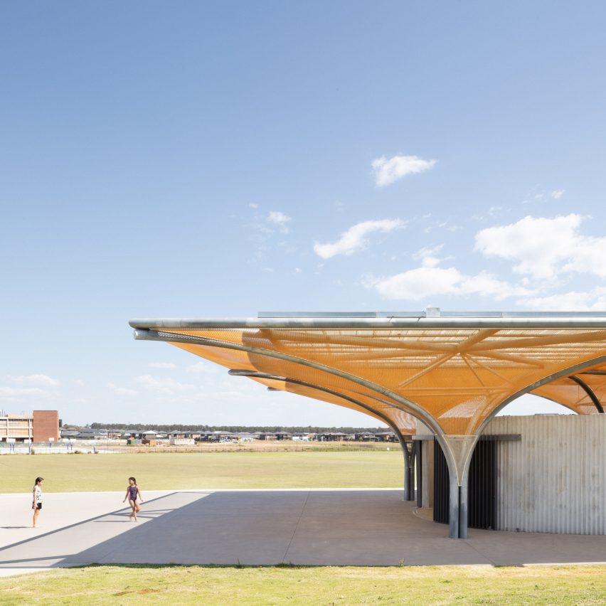 Golden mesh shades a sports pavilion in Sydney