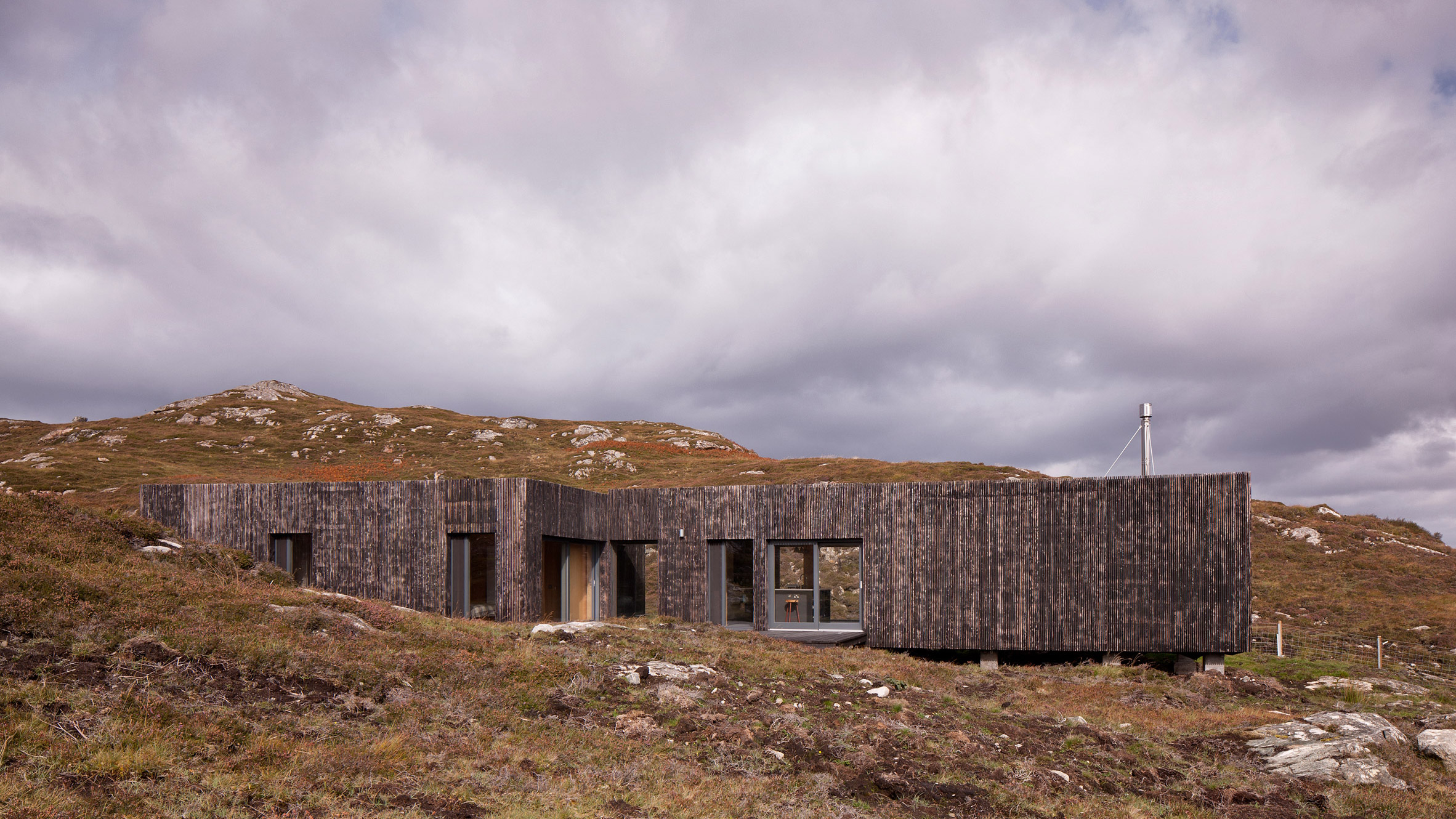 Scottish house clad in burnt larch
