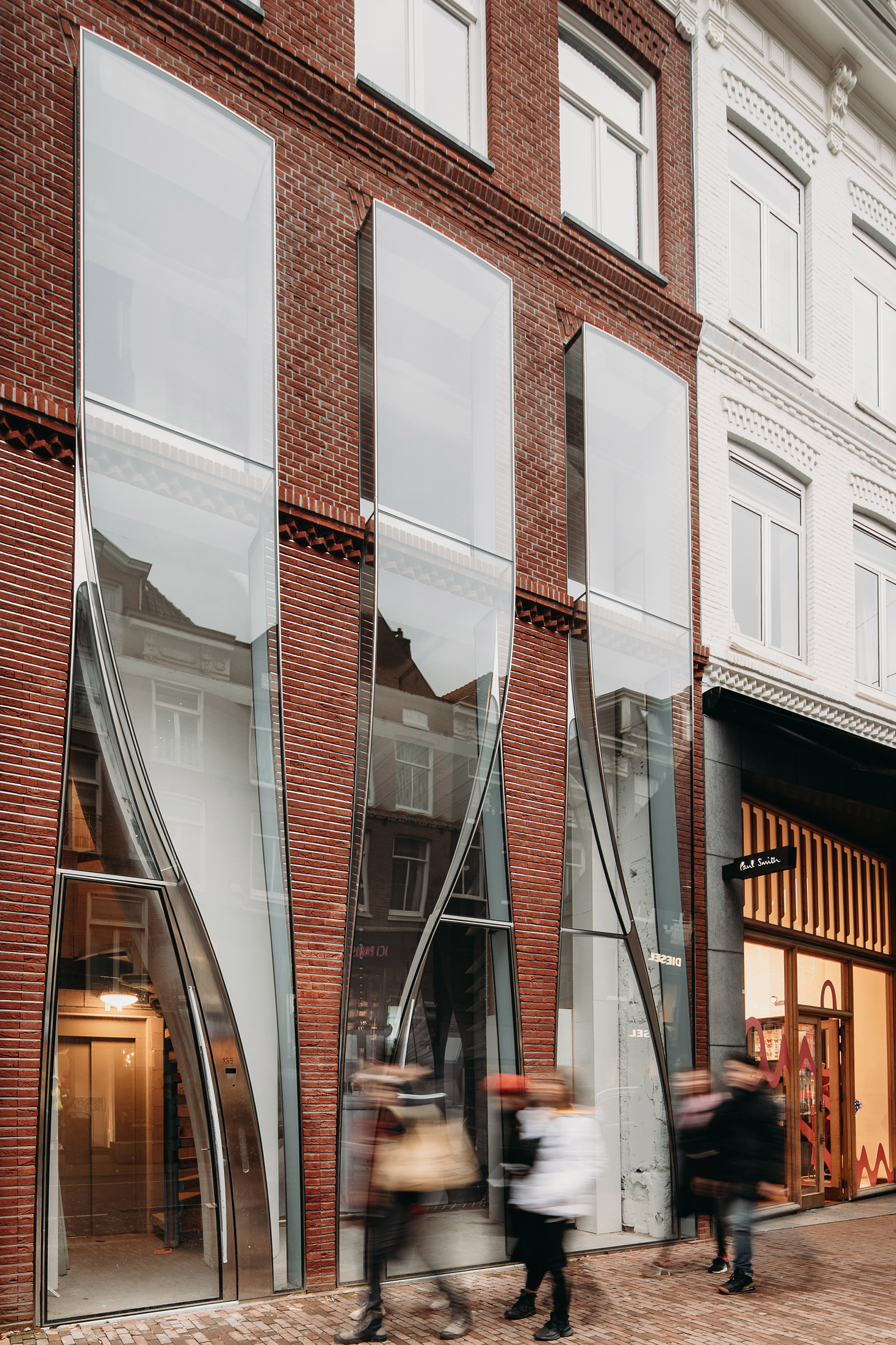 UNStudio mimics textiles with glass for store on PC Hooftstraat