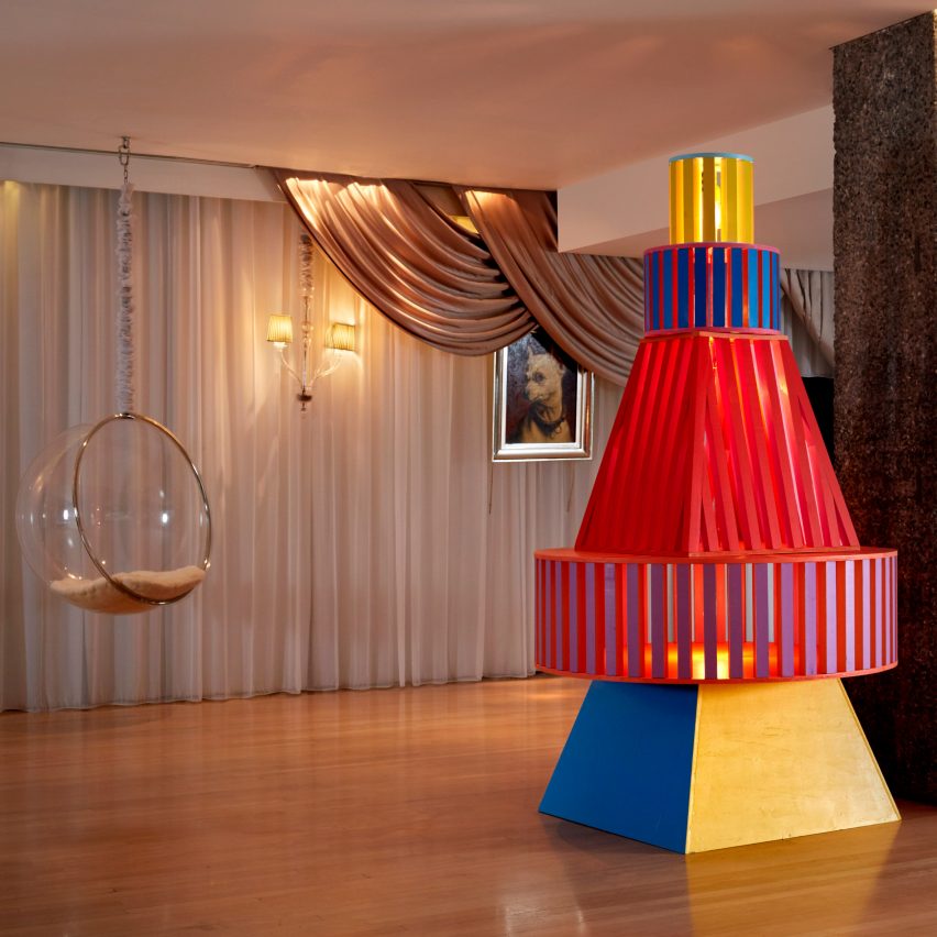 Yinka Ilori creates brightly coloured Christmas tree for London hotel
