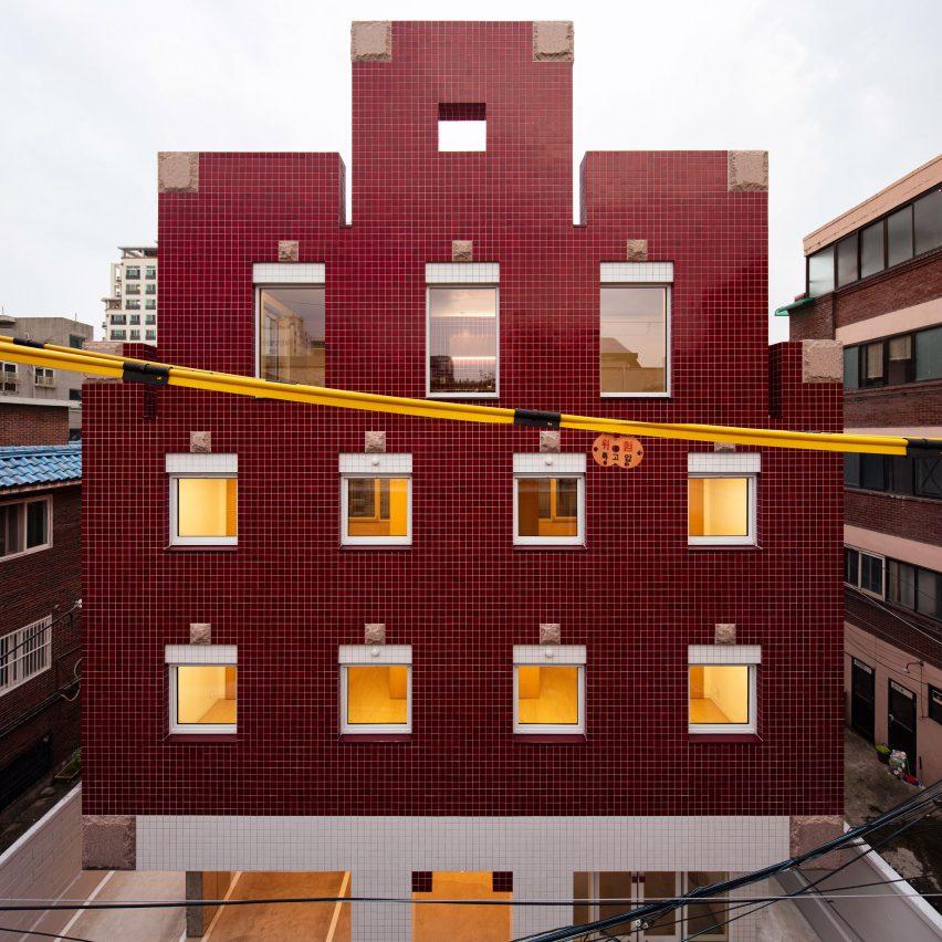 Blocky Minecraft-themed apartment building in Seoul clad with pixel-like tiles