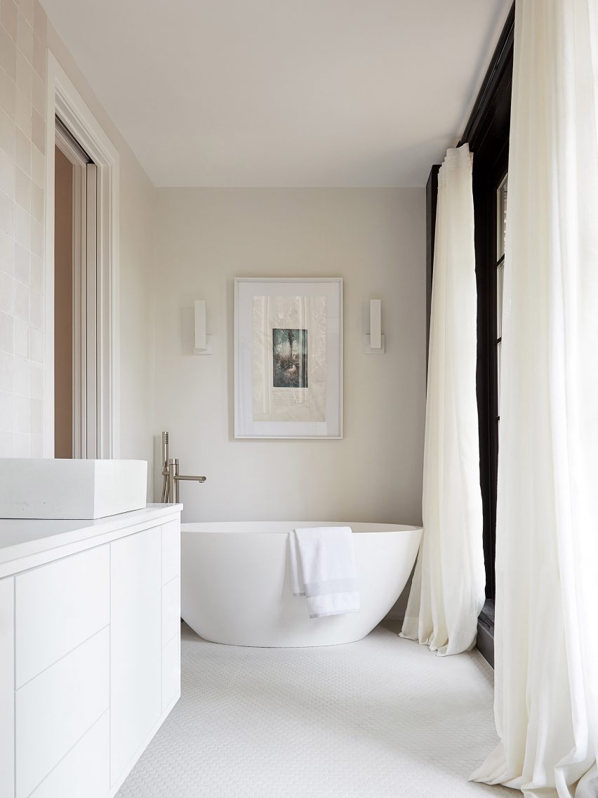 White bathroom with curtains in The Euclid Residence