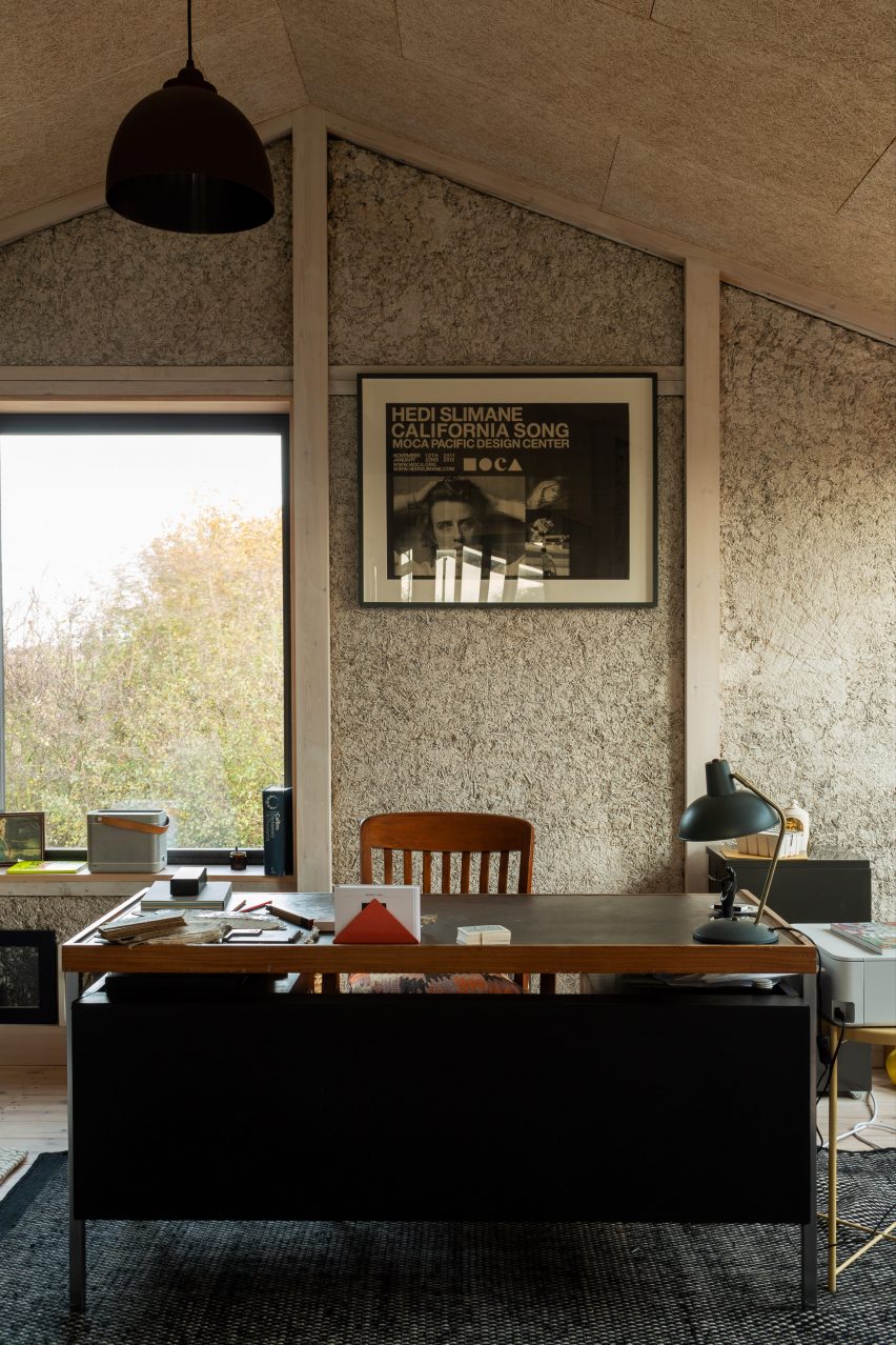 An office with exposed hempcrete walls