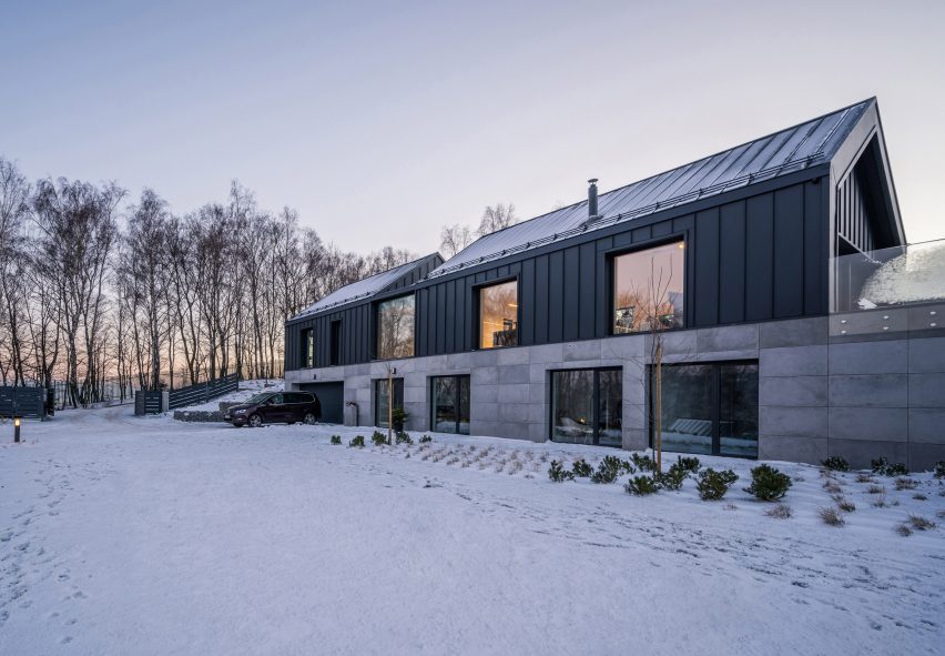 Kropka Studio designs mountain house with glazed cut between gables