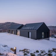 Mountain house in Poland has glazed cut between gables