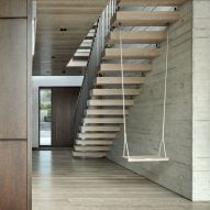 Staircase swing and material details add flair to Highgate house