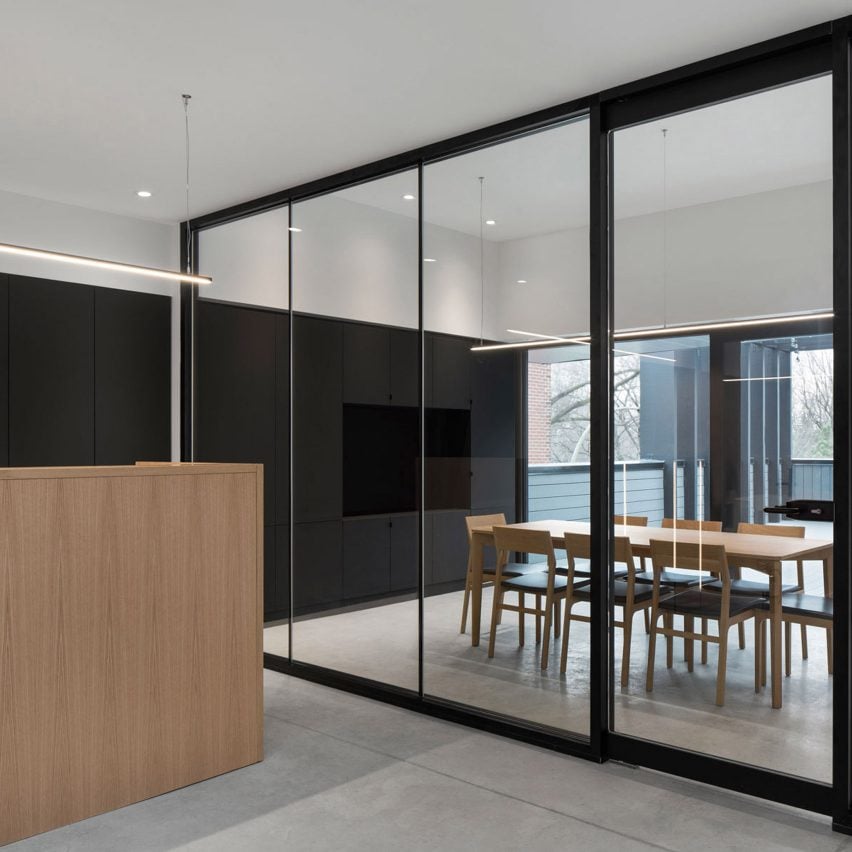 Oak walls partition offices in Montreal law firm by Naturehumaine