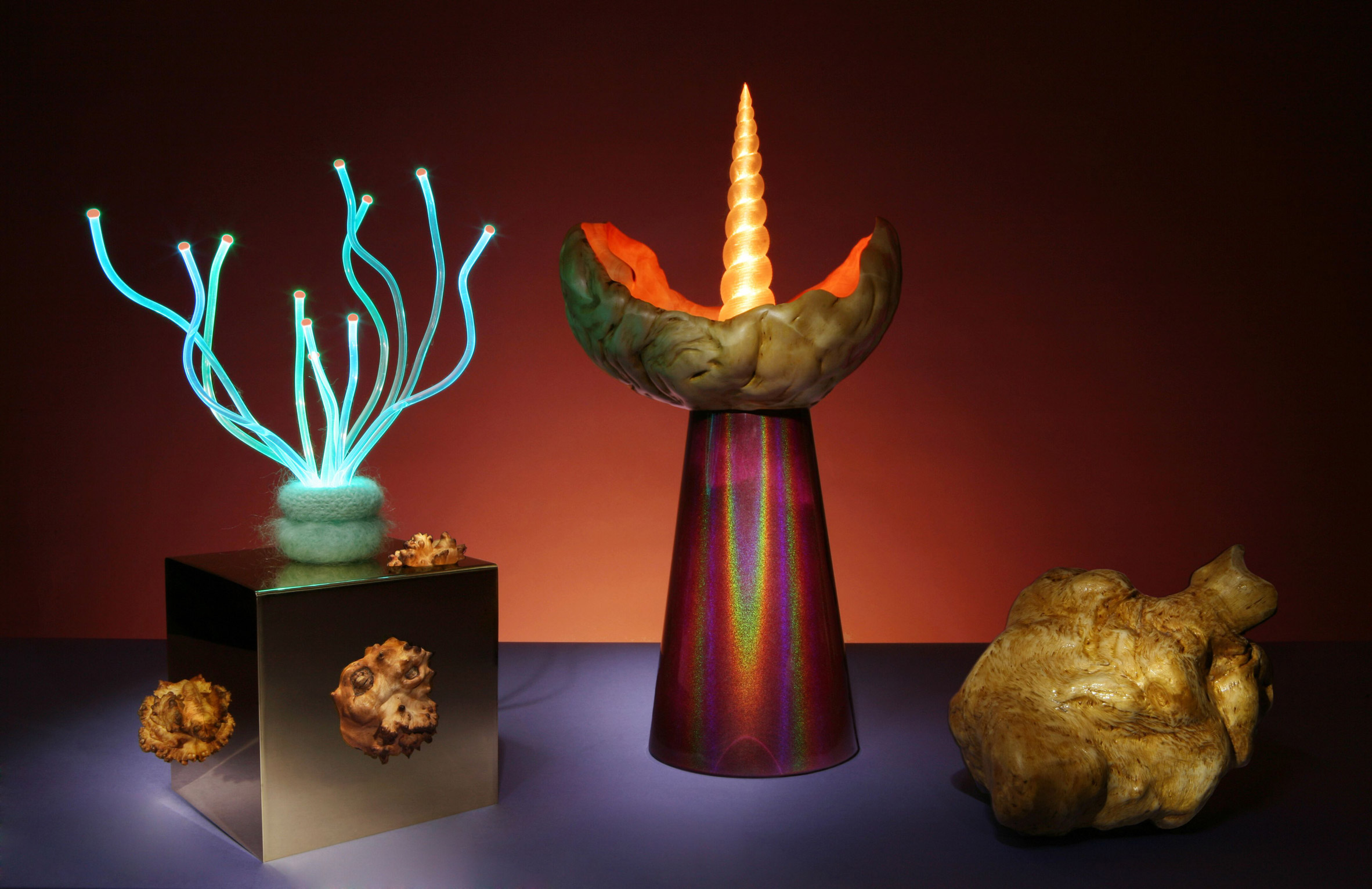 Aia Jüdes merges tree outgrowths with fibre optics for flamboyant lamps