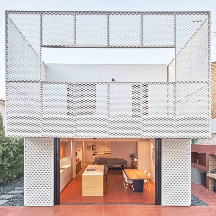 Bonba Studio encases extension in Barcelona in white metal mesh