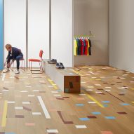Vinyl Allura tiles mimic the look of a reclaimed gym floor