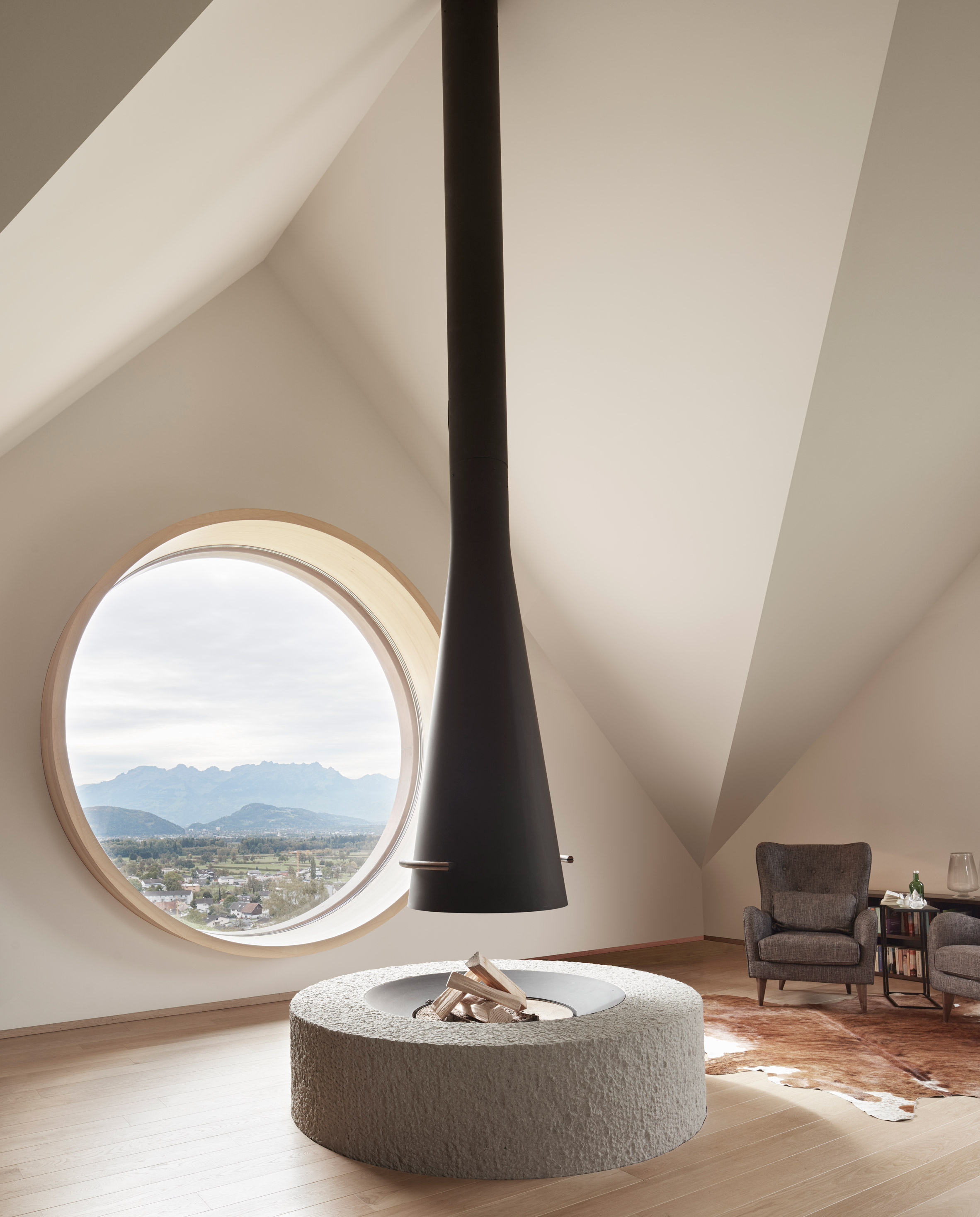 House with Three Eyes by Innauer-Matt Architekten living room