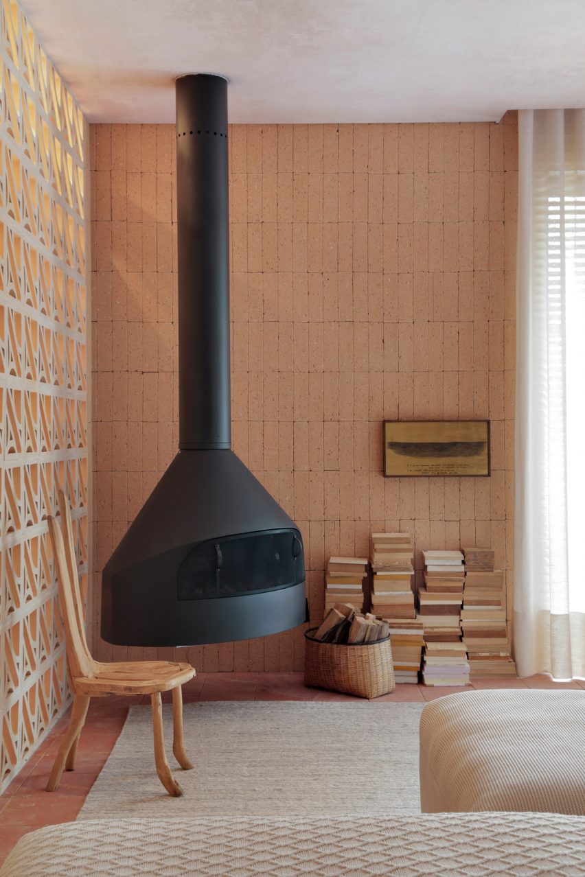 suspended fireplace inside Hygge Studio by Melina Romano