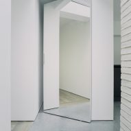 Over The Edge minimalist house by Jonathan Burlow mirrored door