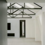 Art takes centre stage in monochrome London loft by Originate