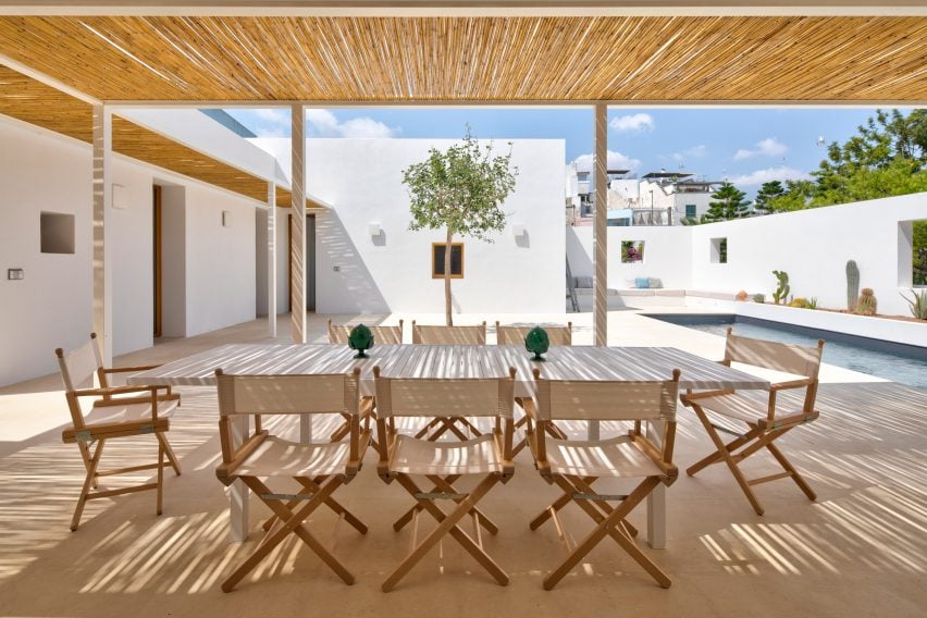 Sunny dining spot in Puglia house with white walls