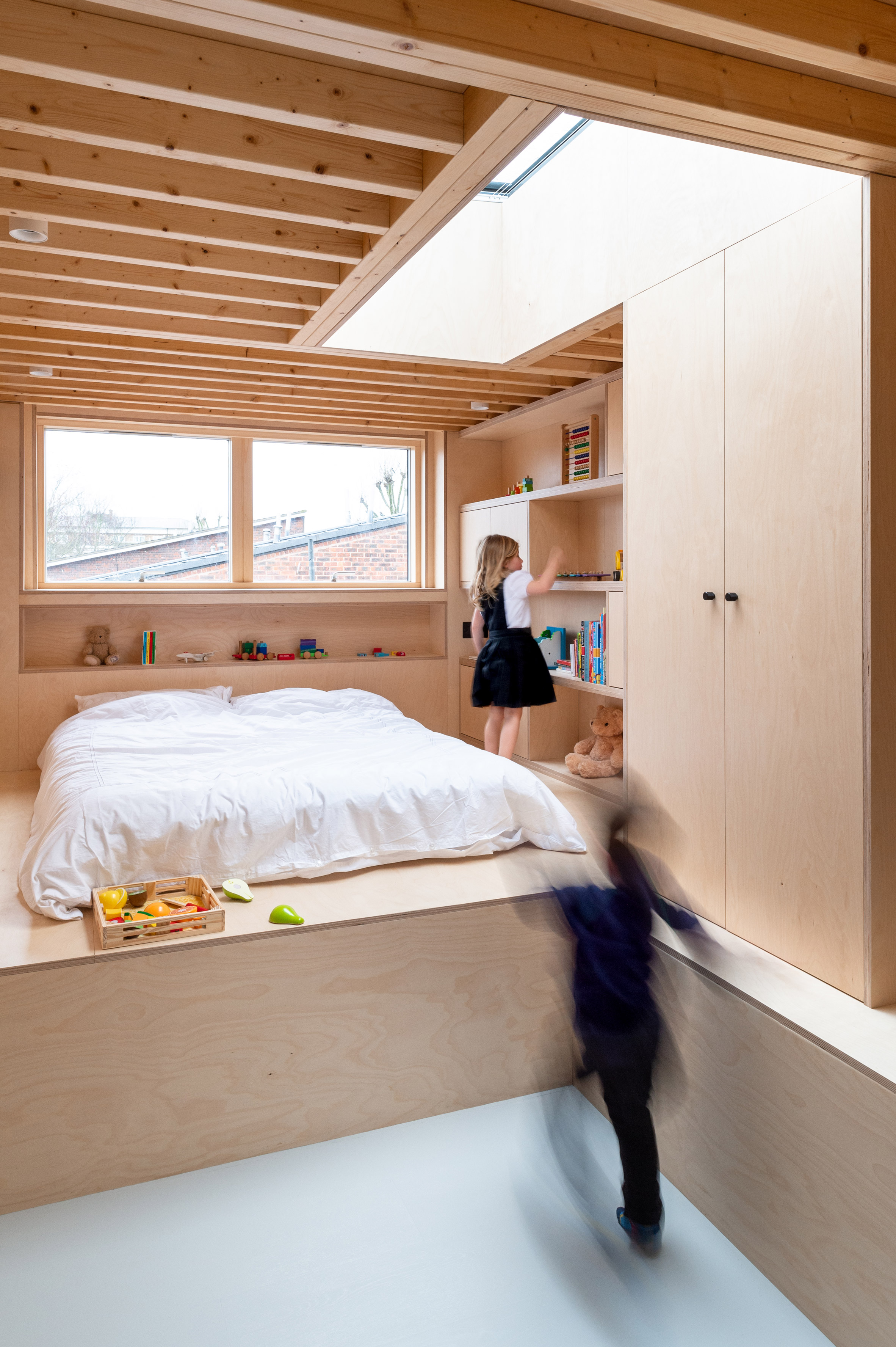 A timber-lined bedroom