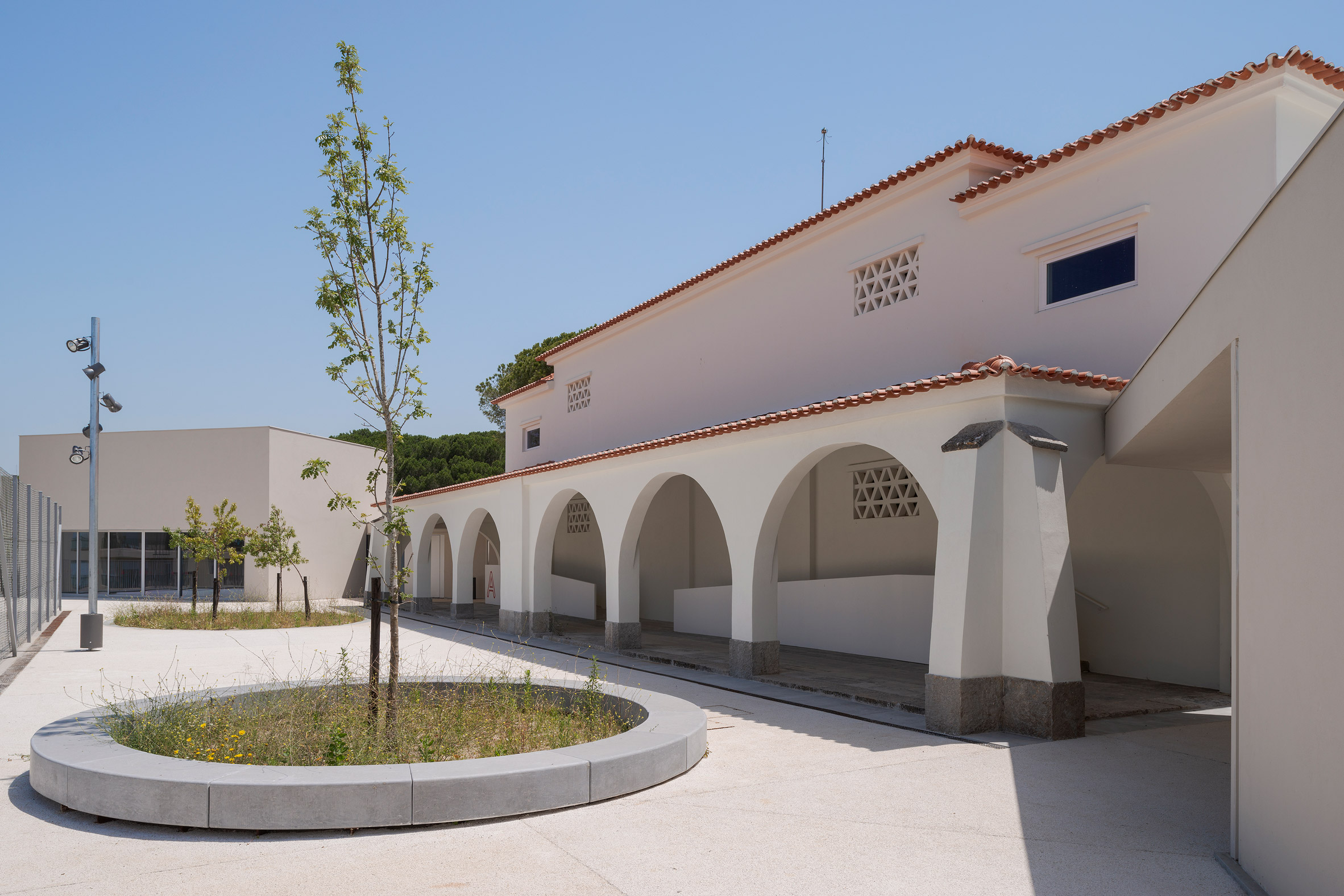 Site Specific Arquitectura added an extension to a 1950s school in Caselas, Lisbon