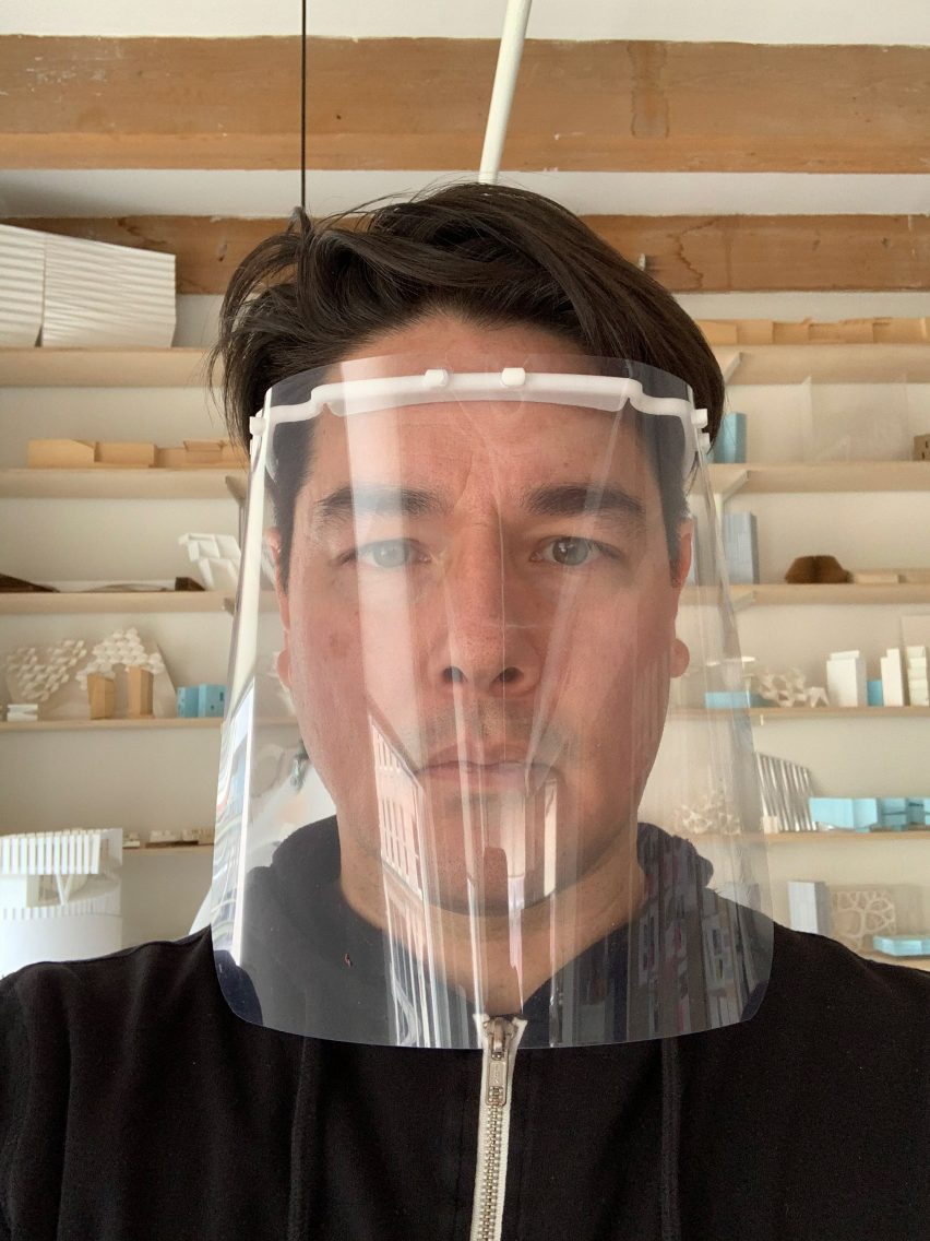 Eric Höweler wearing an open-source face shield he printed in his studio