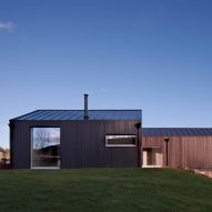 TAP Architects builds black house atop old granite mill in Scotland