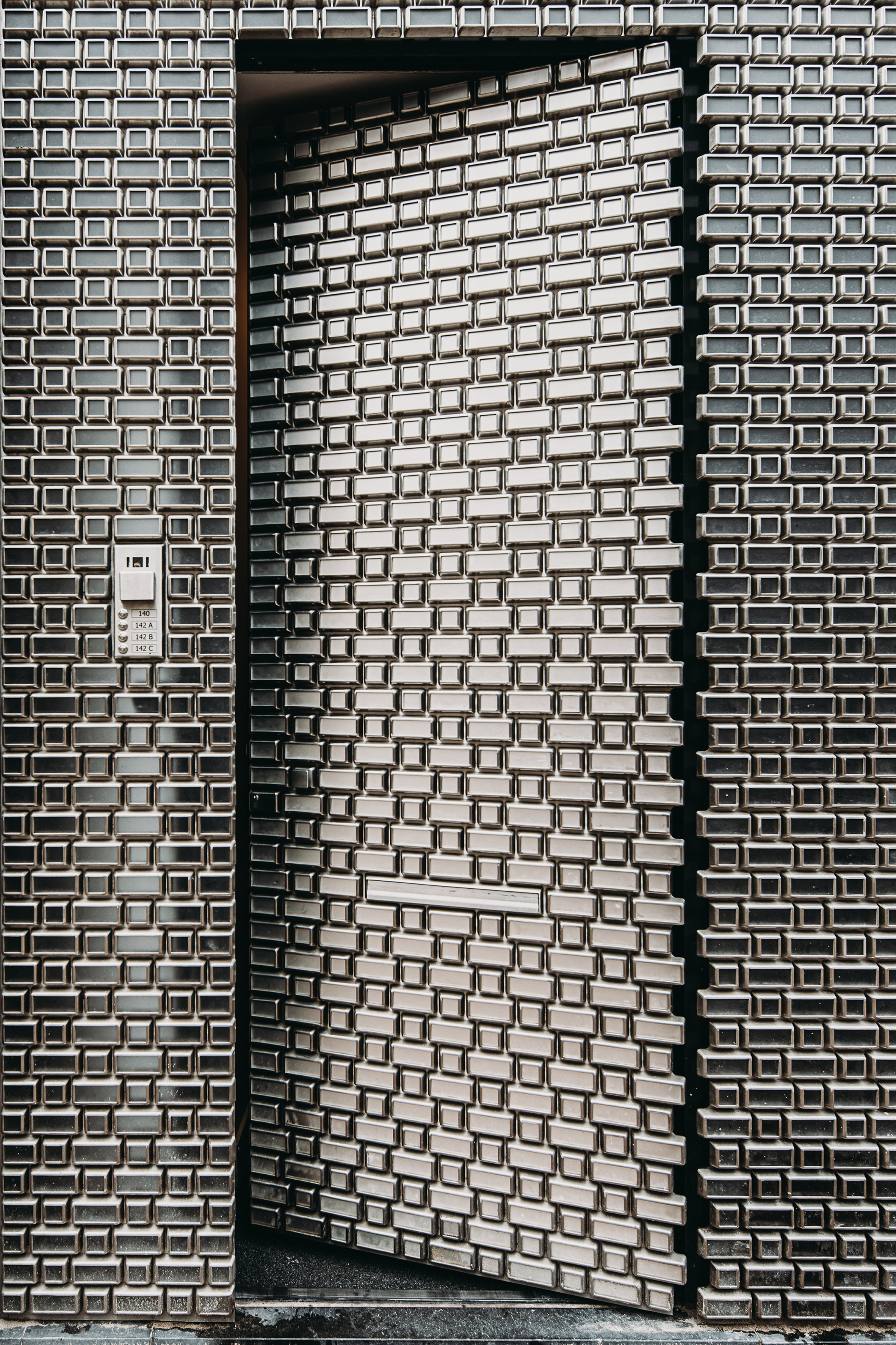 Louis Vuitton store on PC Hooftstraat called Brick Pixelation by UNStudio