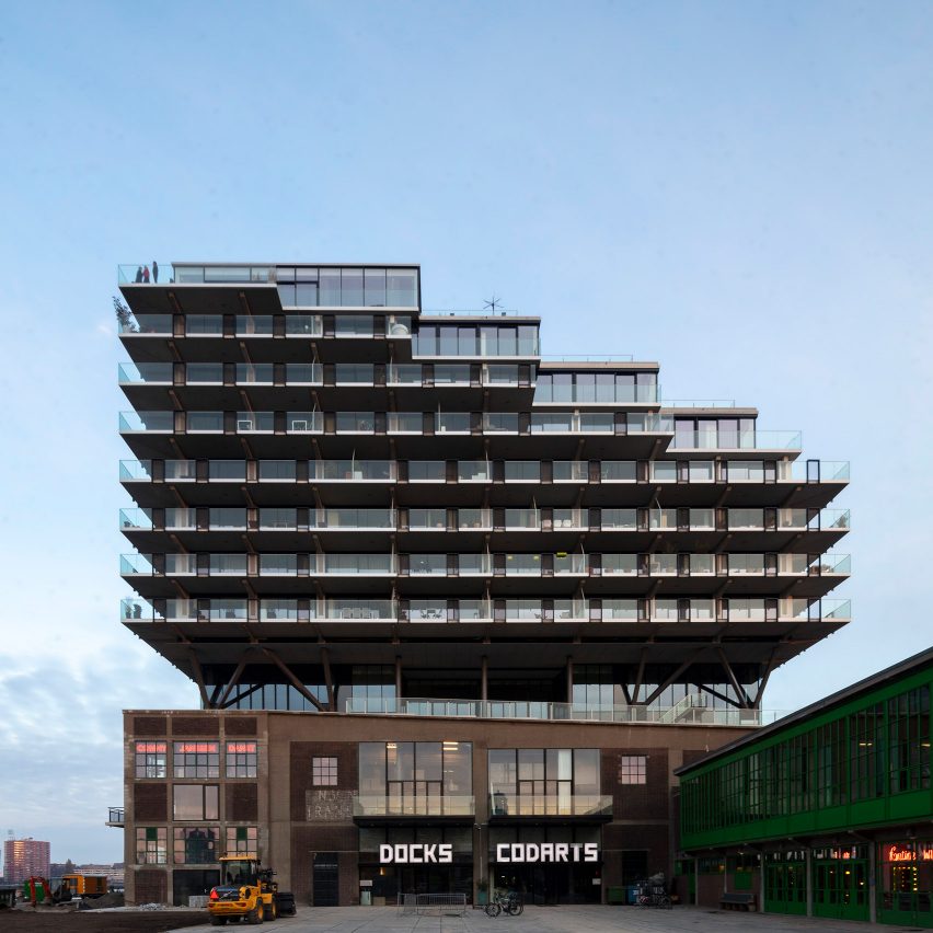 Mei Architects perches Fenix I apartments on dockside warehouse in Rotterdam