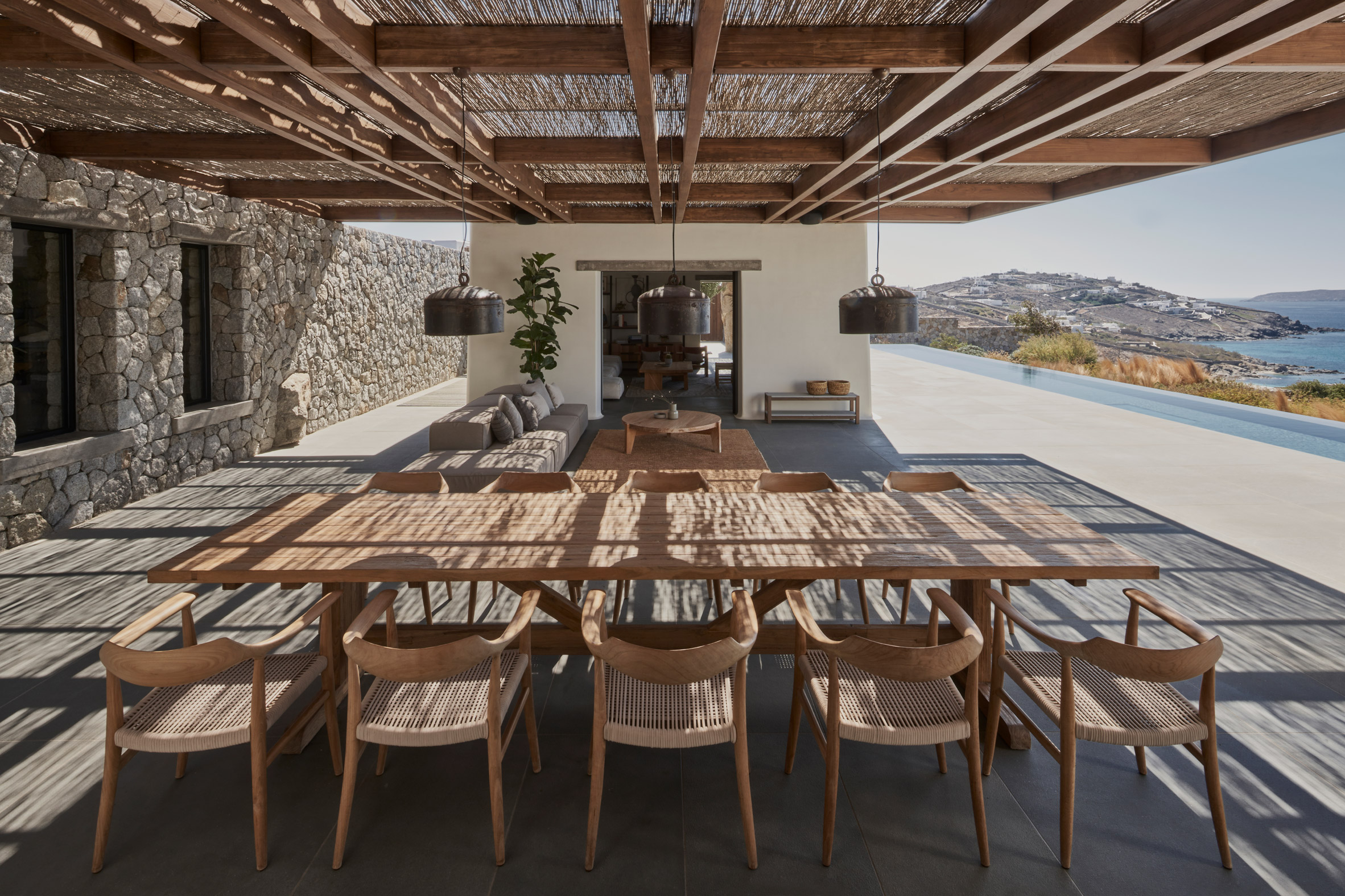 K Studio builds stone and timber holiday house on Mykonos