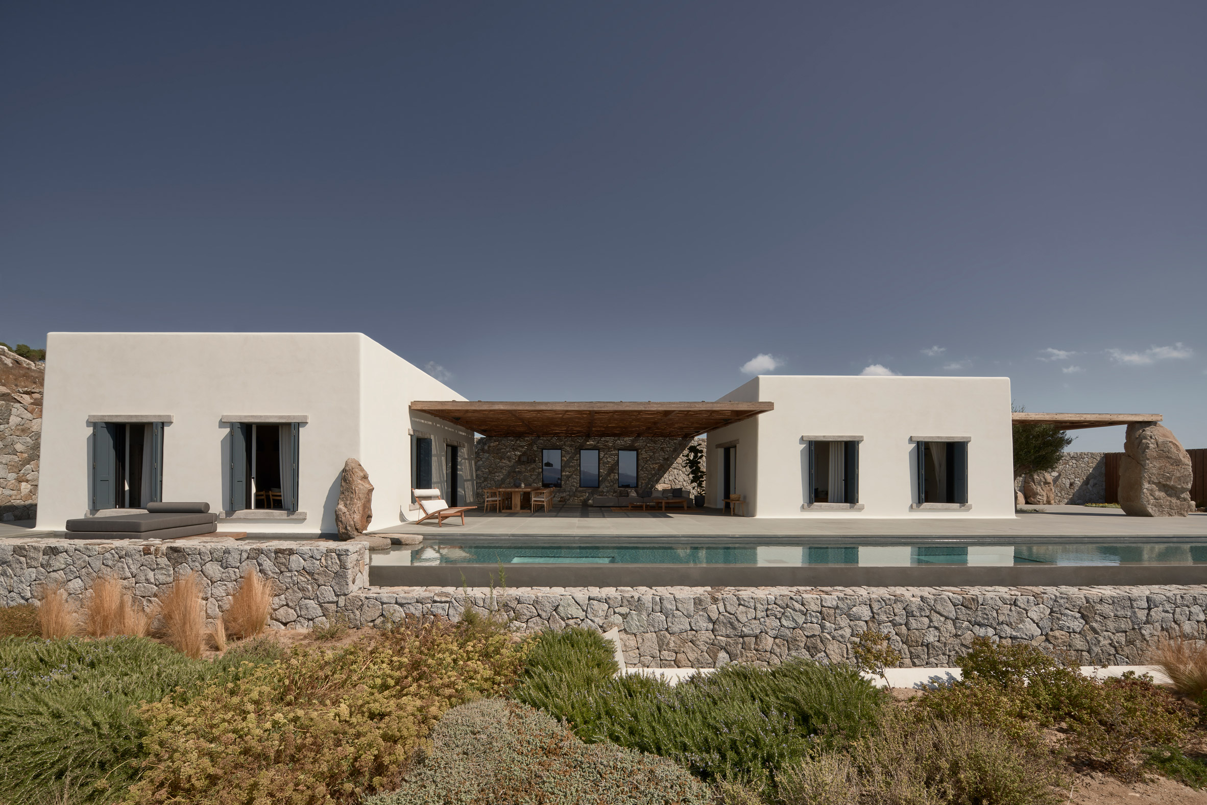 K Studio builds stone and timber holiday house on Mykonos