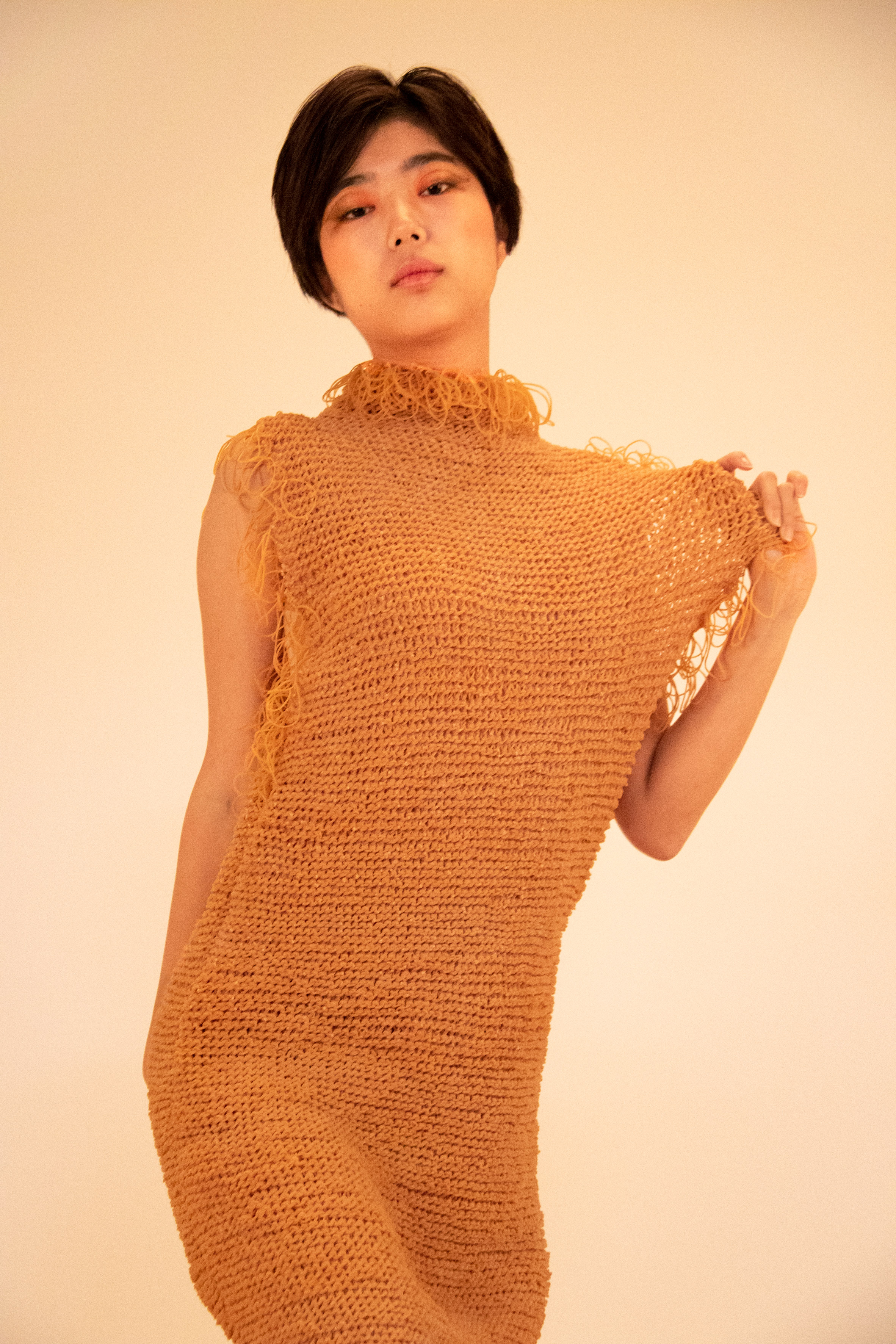 Rie Sakamoto knits rubber bands together like yarn for elastic garments