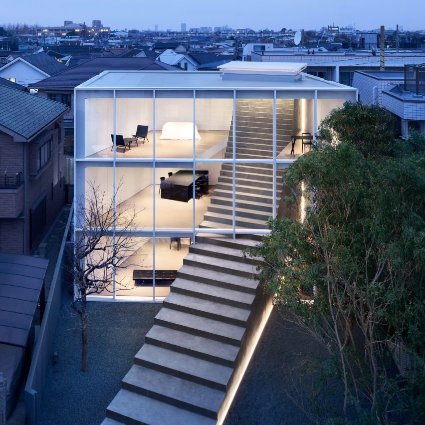 Steel and concrete steps cut through facade of Stairway House by Nendo