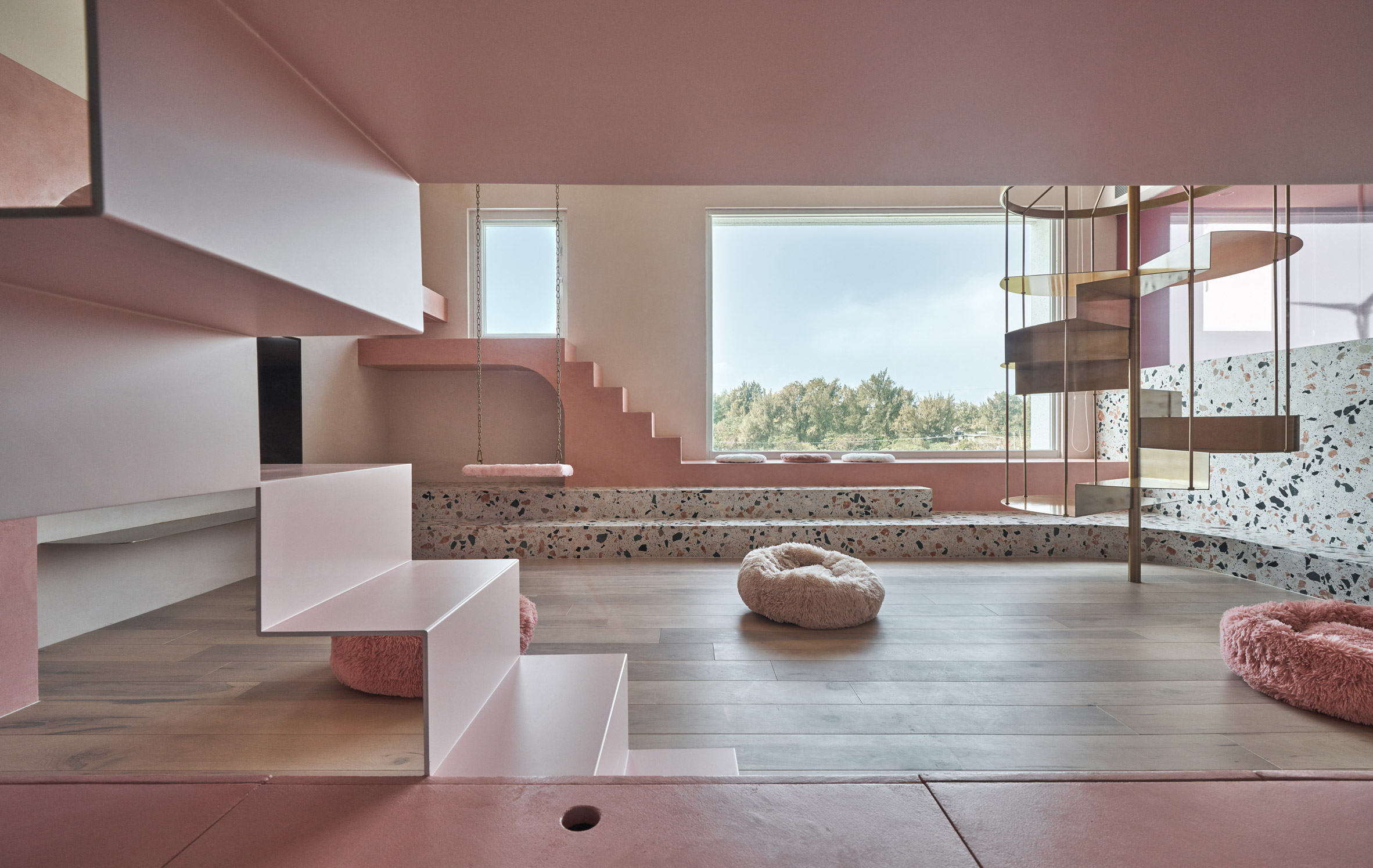 Pink holiday home by KC Design Studio features dedicated cat room