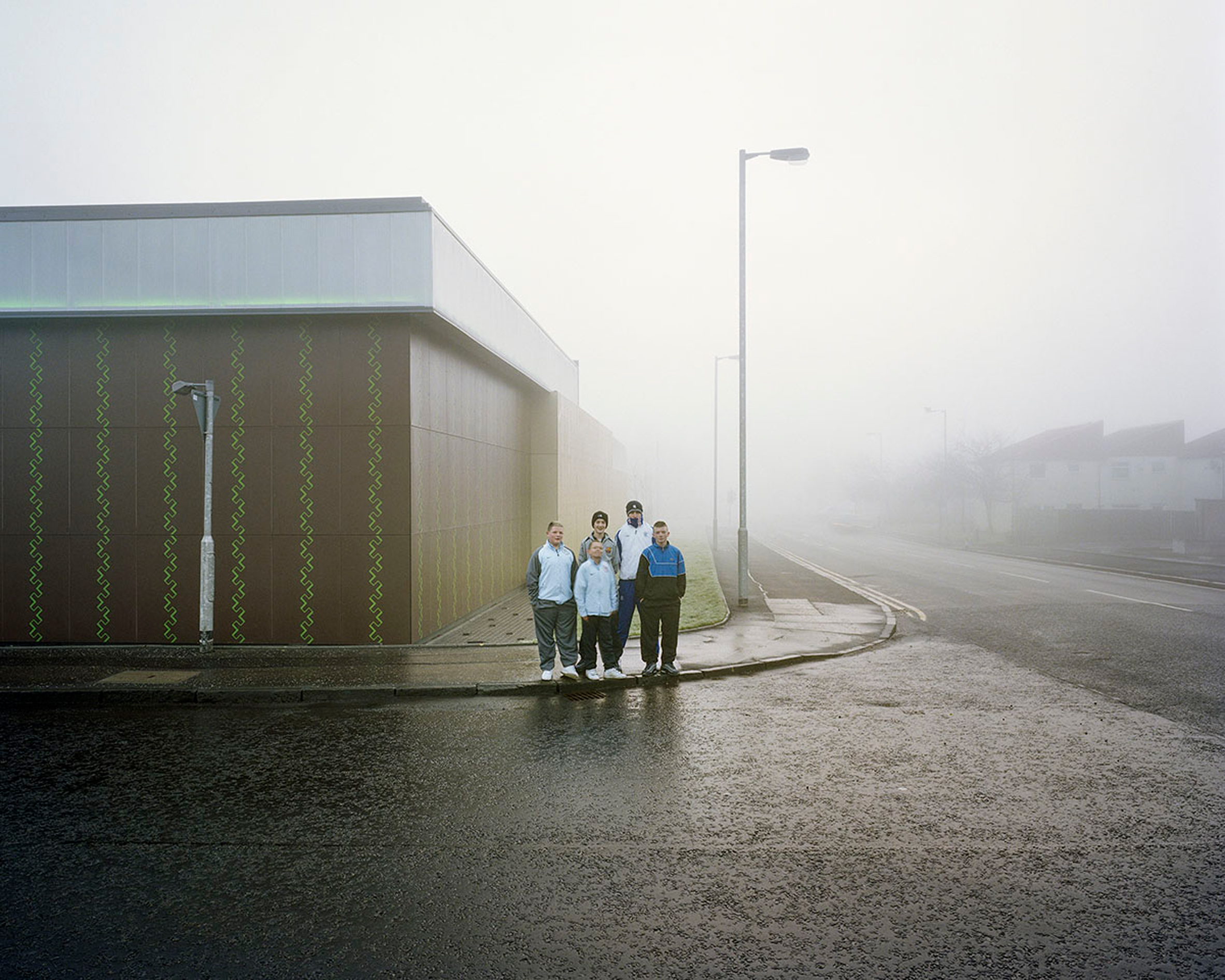 A group of youths in Glasgow photographed by Anthony Coleman, who appears on a Zoomed In panel