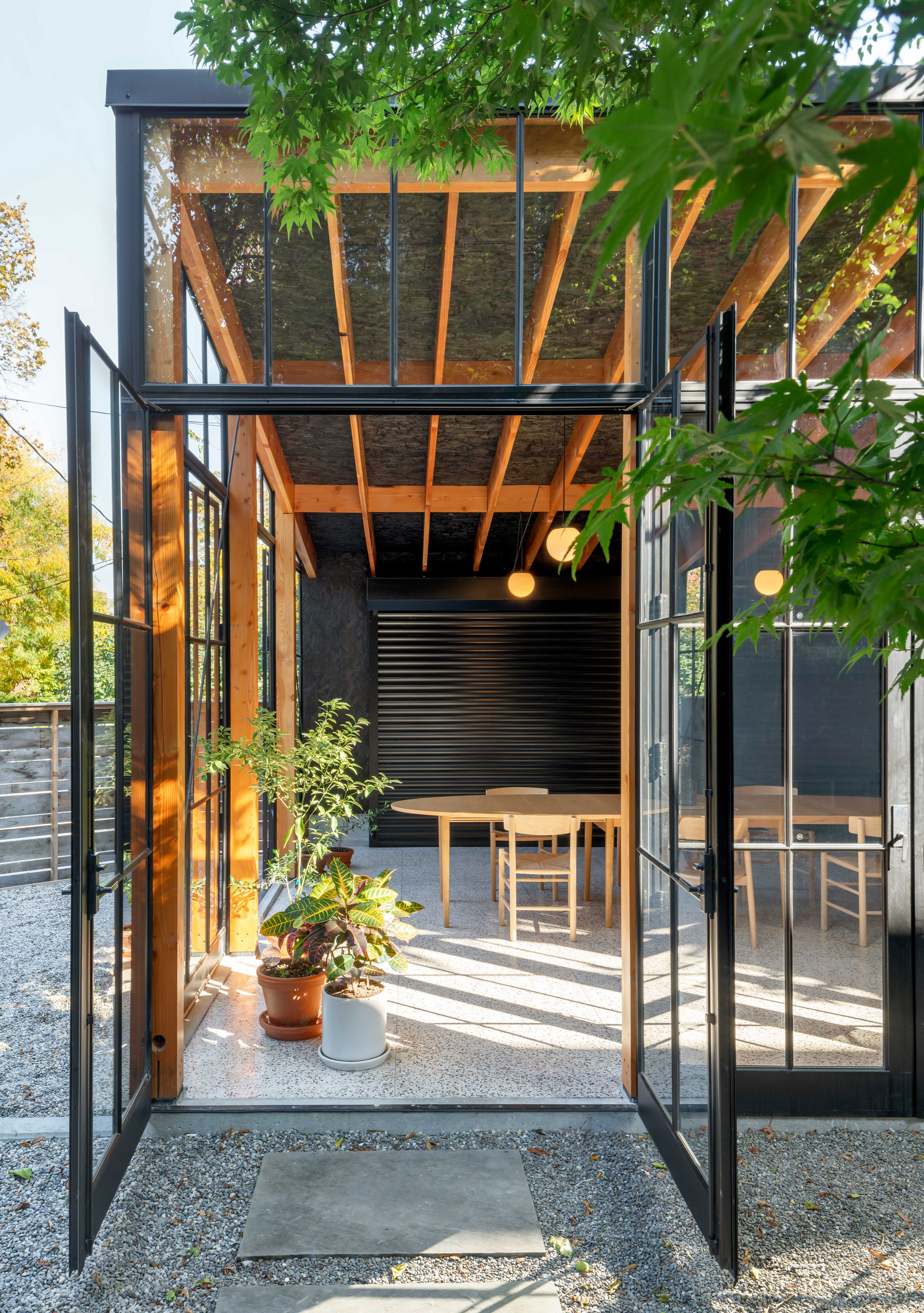 Office Ou turns Toronto garage into workshop, conservatory and