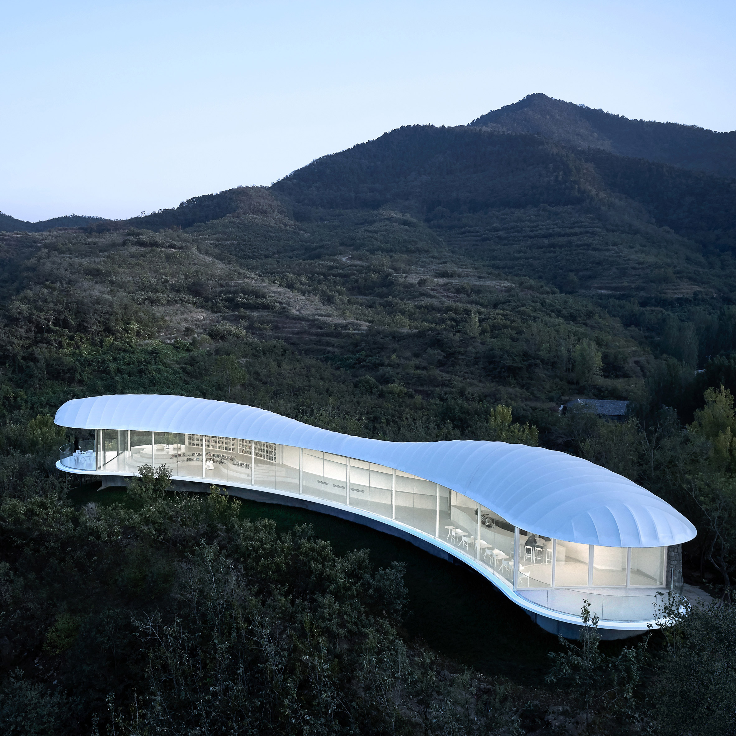 Gad Line+ Studio perches white cloud-like pavilion in mountains in 