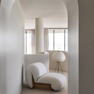 Curved forms and beige tones pervade Penthouse M by CJH Studio