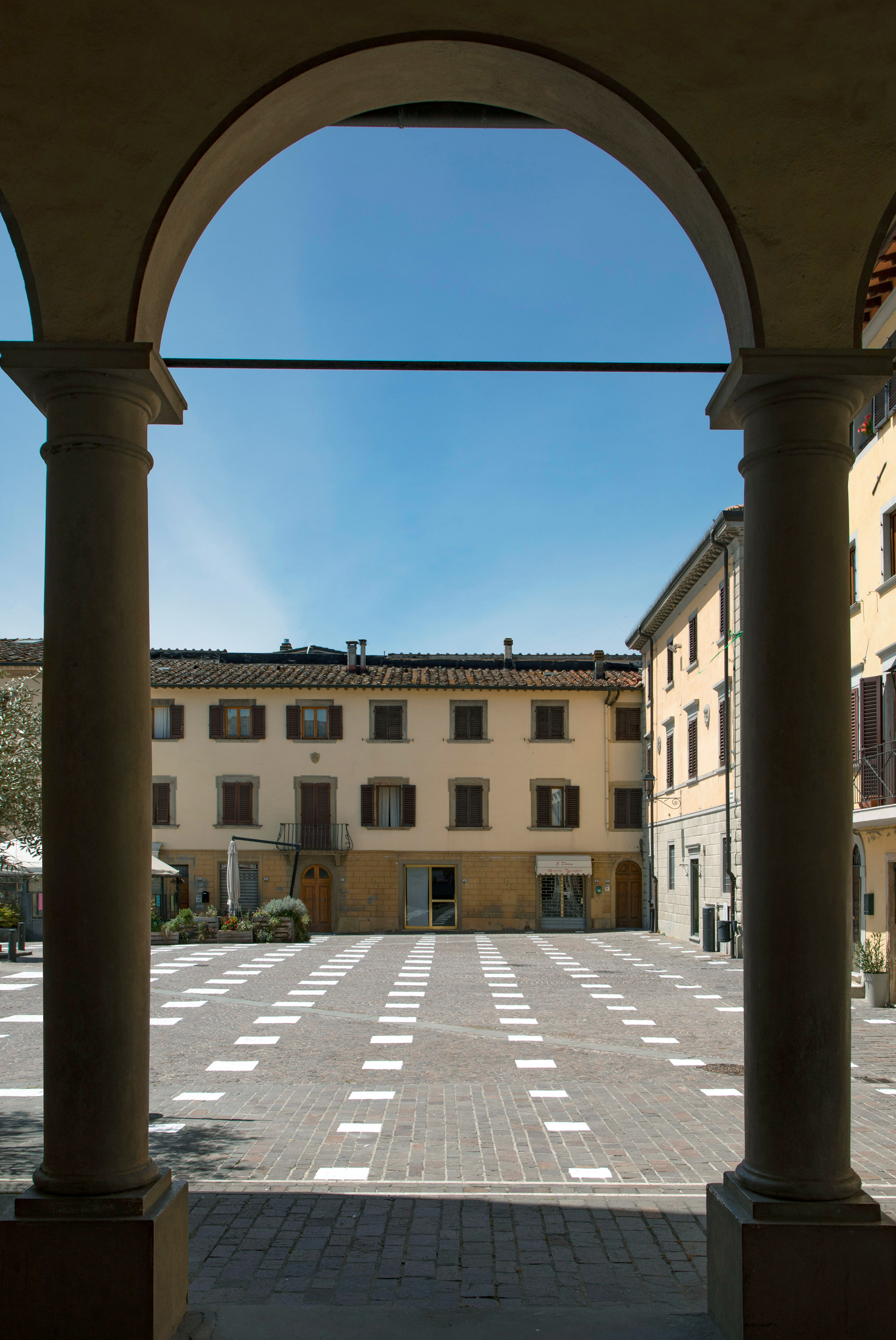 Caret Studio installs grid-like social distancing system in Italian plaza