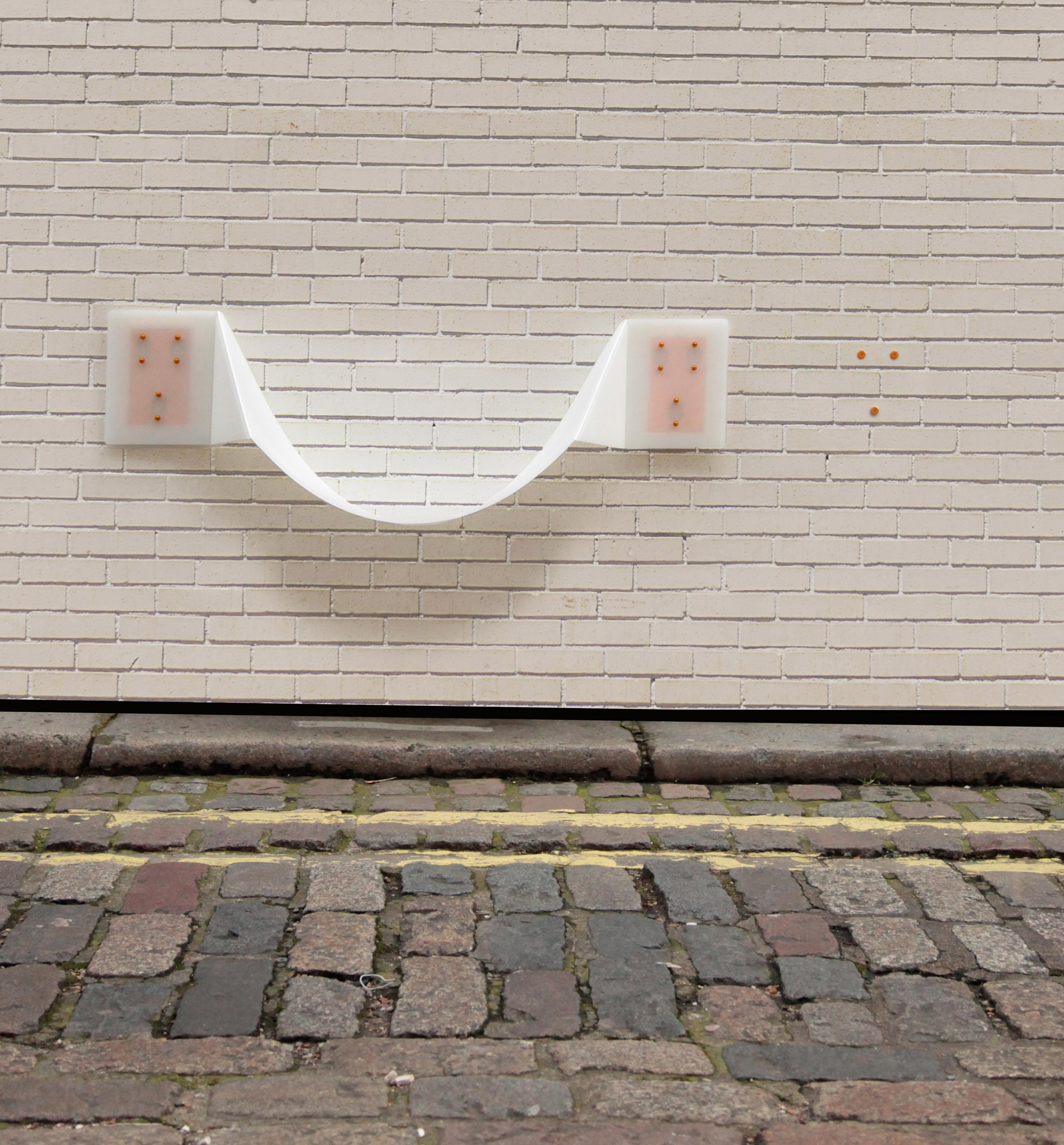 Thomas Gossner's wall-mounted Flair chair takes cues from plastic lunchboxes
