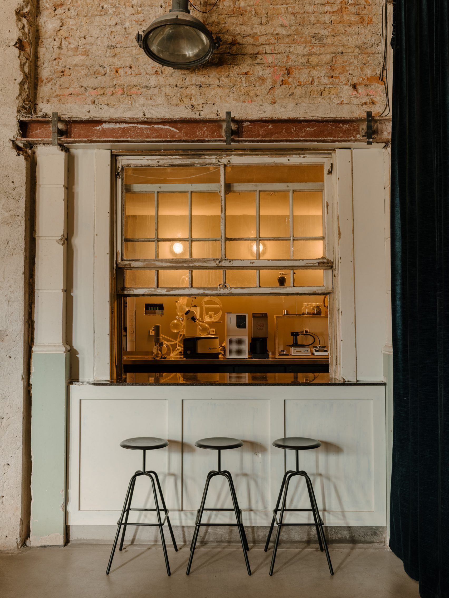 Kink restaurant in Berlin is dominated by a red-neon light installation